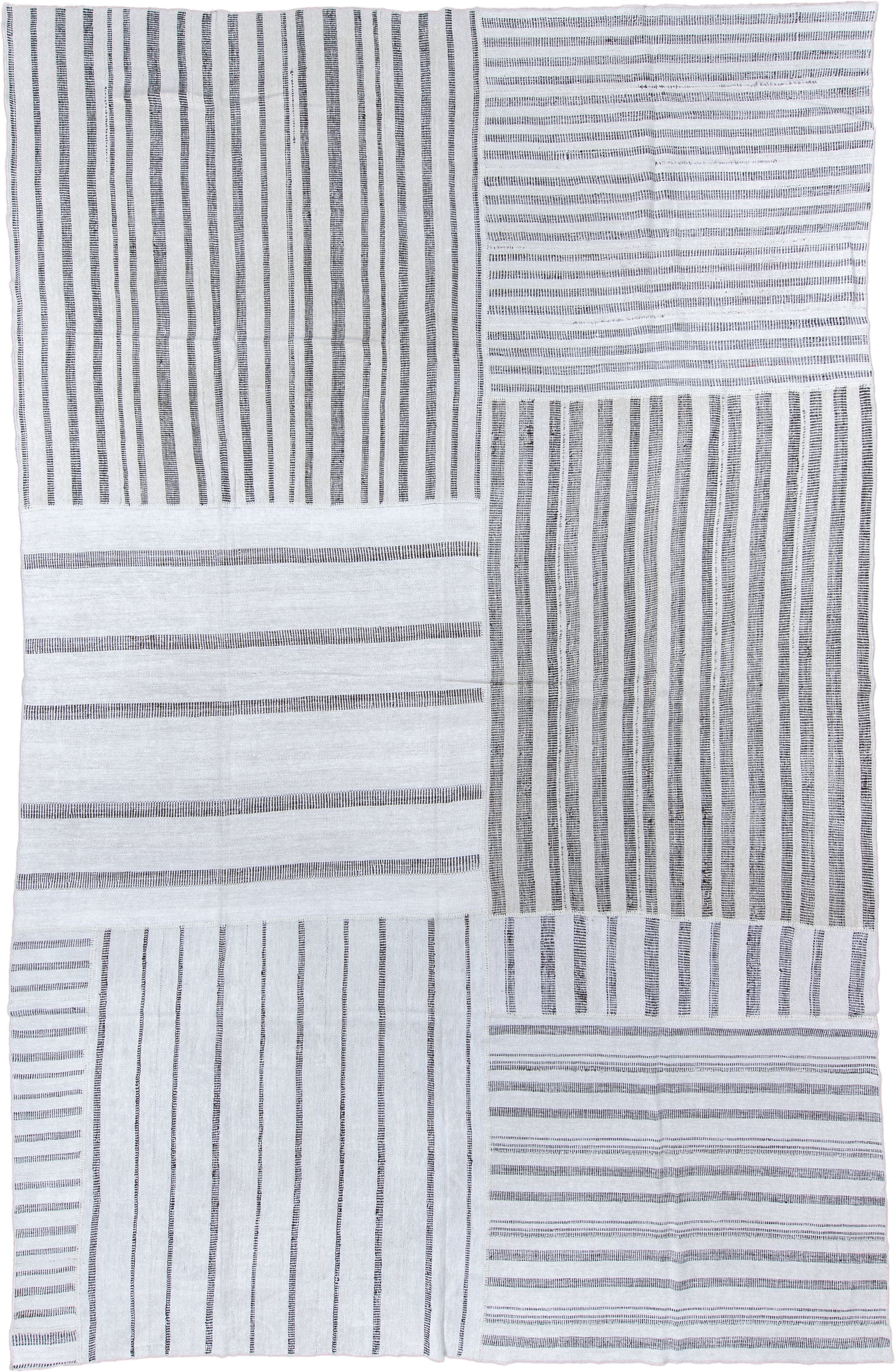 10' x 15' one-of-a-kind handmade vintage Kilim rug. Color palette: ivory, charcoal, gray, black