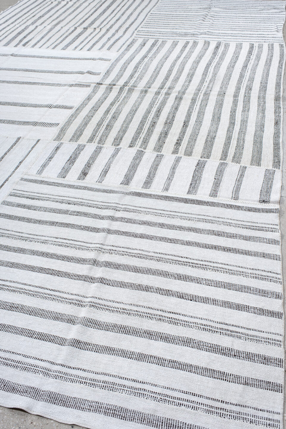 10' x 15' one-of-a-kind handmade vintage Kilim rug. Color palette: ivory, charcoal, gray, black