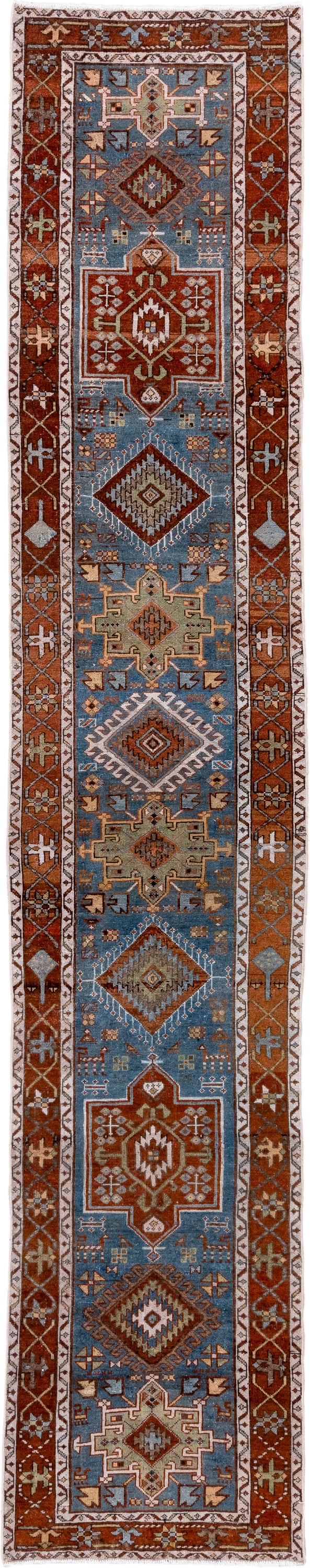 2' x 14' one-of-a-kind handmade vintage Heriz runner rug. Color palette: sky blue, rust, ivory, camel, taupe, brown