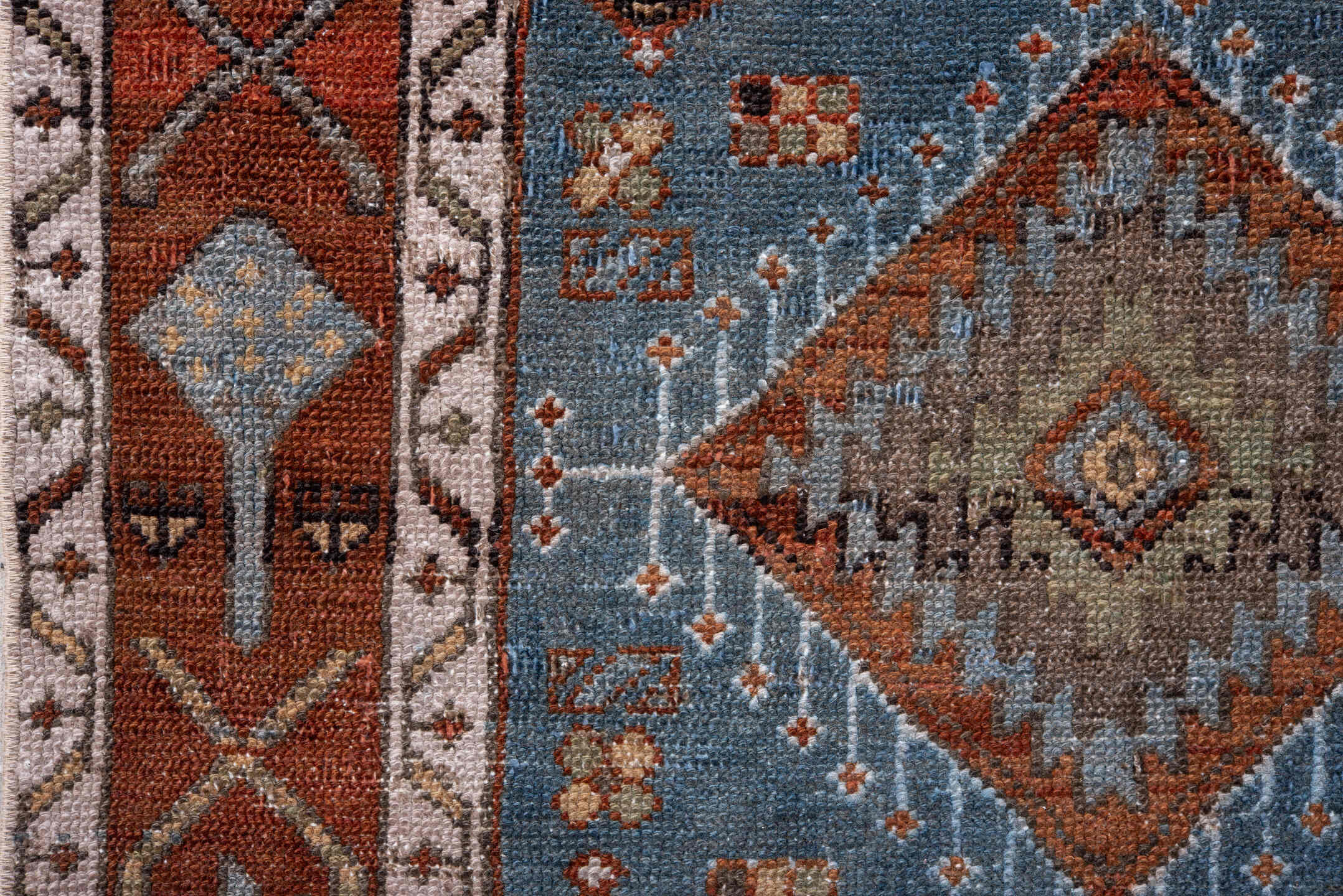 2' x 14' one-of-a-kind handmade vintage Heriz runner rug. Color palette: sky blue, rust, ivory, camel, taupe, brown