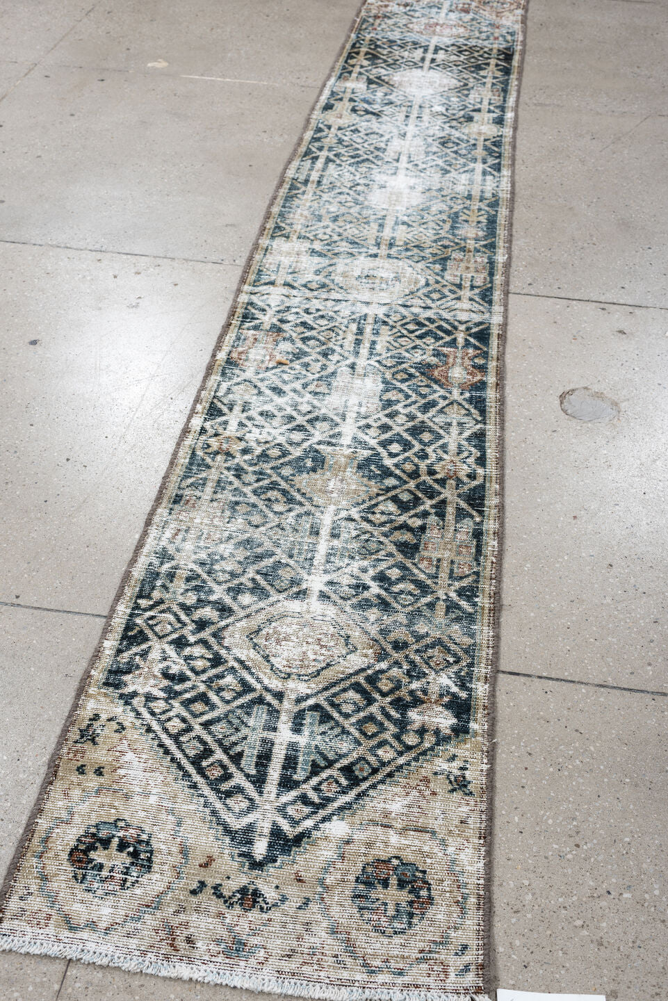 1' x 10' one-of-a-kind handmade antique Malayer rug. Color palette: indigo, ivory, slate, taupe, rust, camel, blue gray