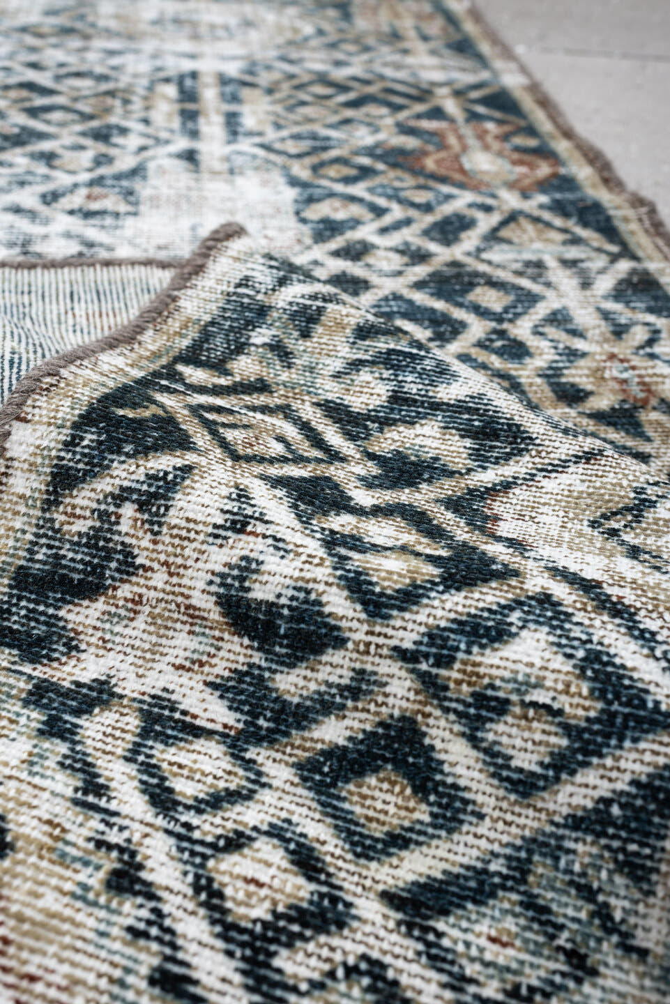 1' x 10' one-of-a-kind handmade antique Malayer rug. Color palette: indigo, ivory, slate, taupe, rust, camel, blue gray