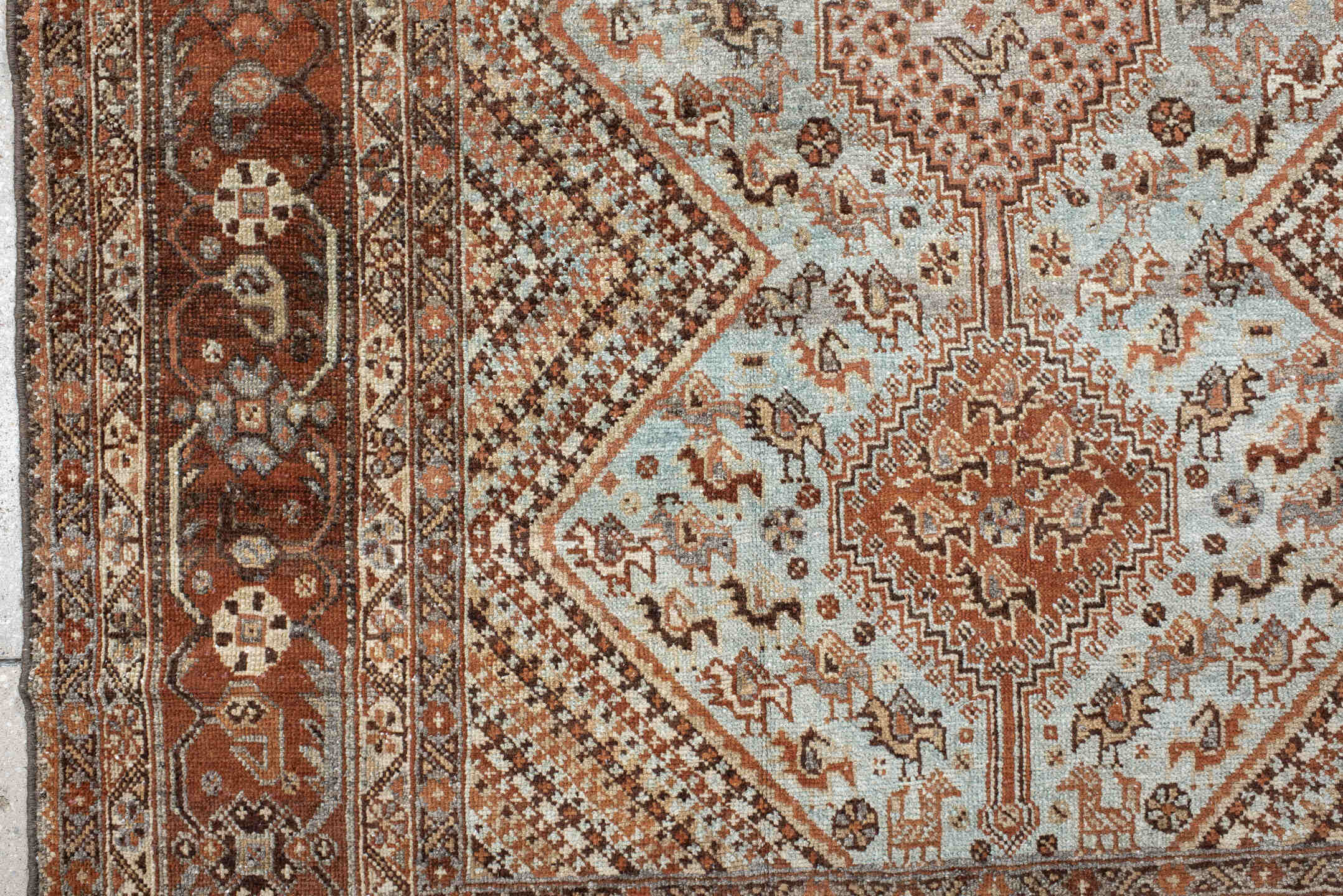 4' x 5' one-of-a-kind handmade antique Afshar small size rug. Color palette: rust, ivory, light blue, brown, camel, charcoal