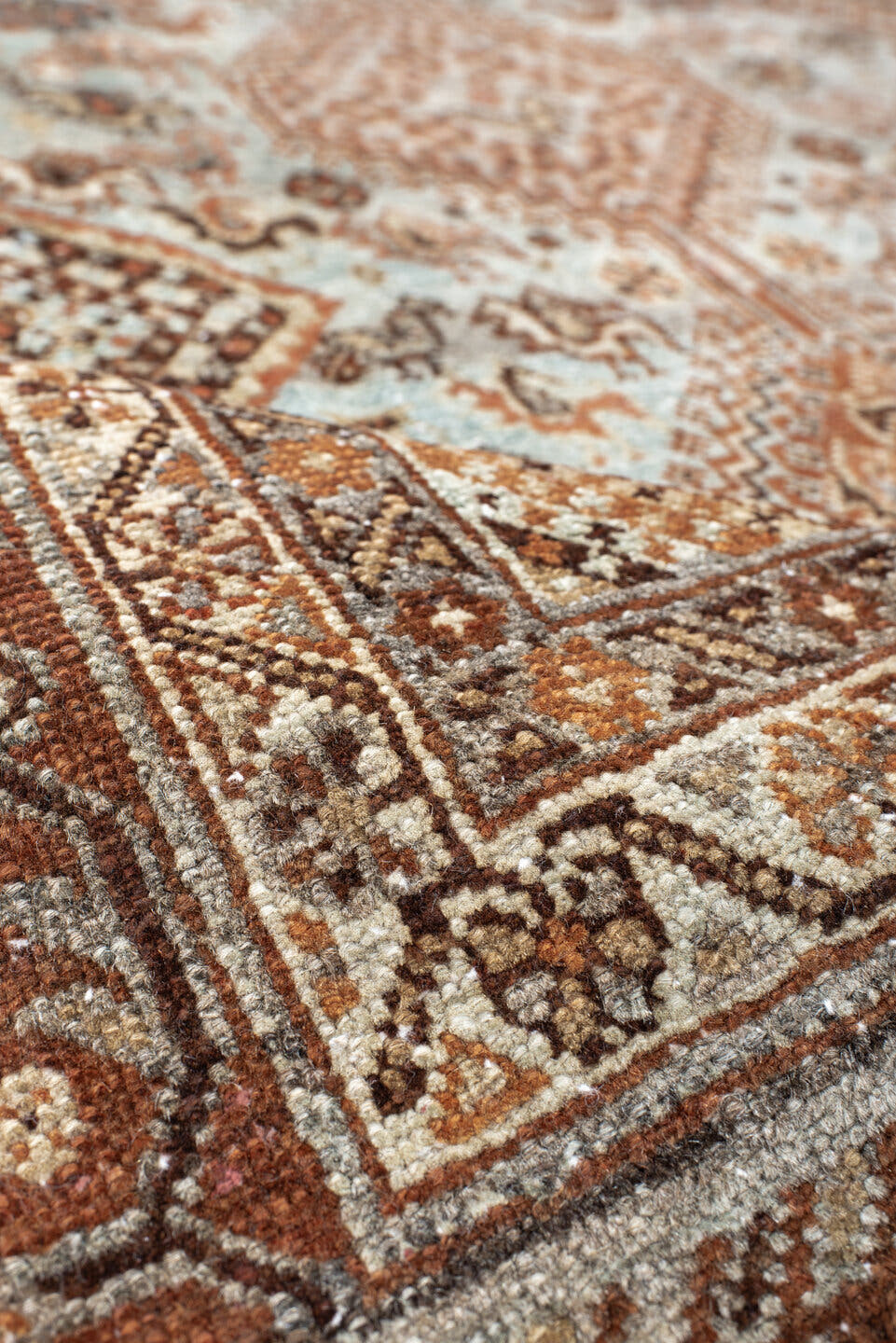 4' x 5' one-of-a-kind handmade antique Afshar small size rug. Color palette: rust, ivory, light blue, brown, camel, charcoal