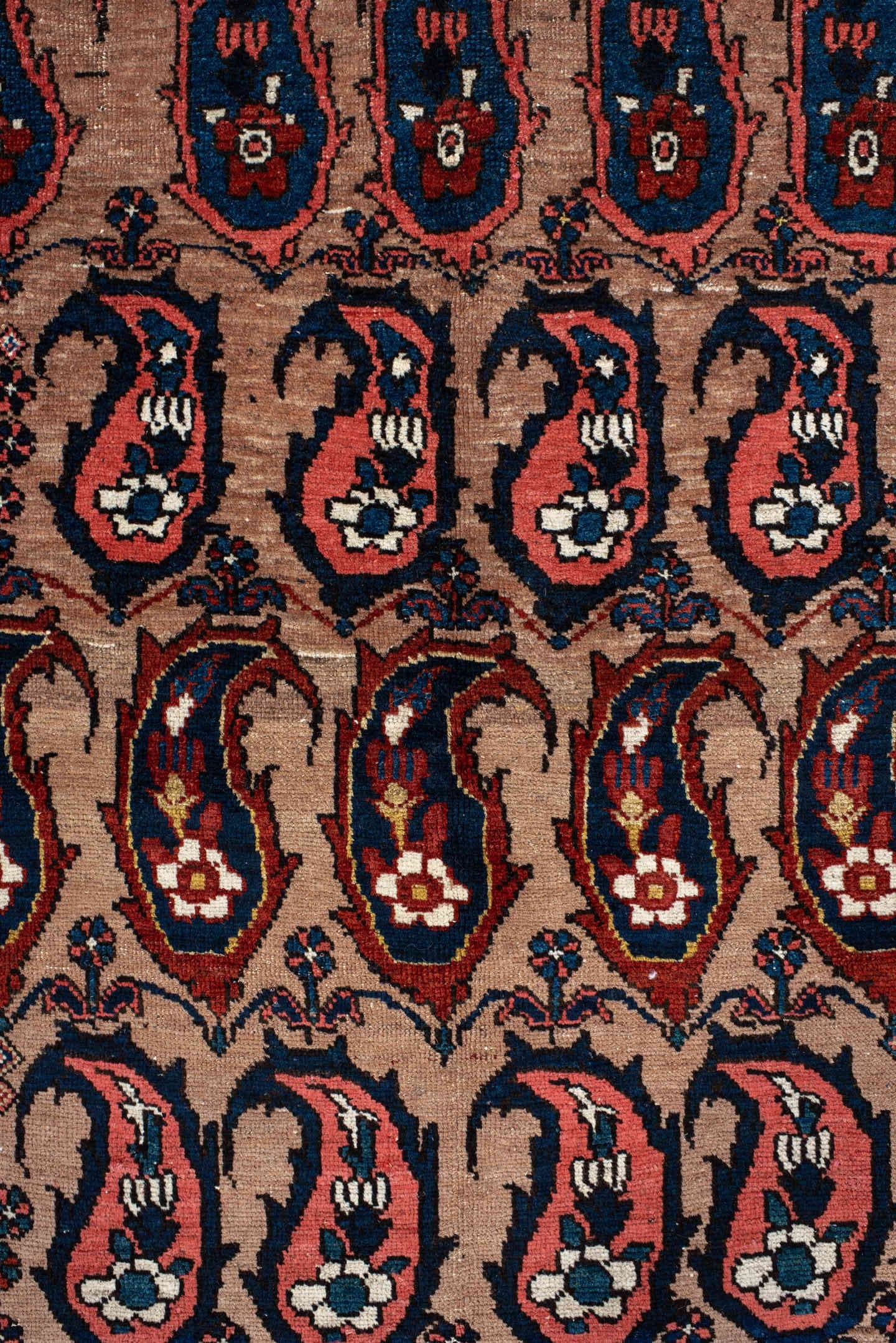 4' x 7' one-of-a-kind handmade antique Baktiary rug. Color palette: rust, indigo, ivory, brick, sky_blue, navy, cream, gold