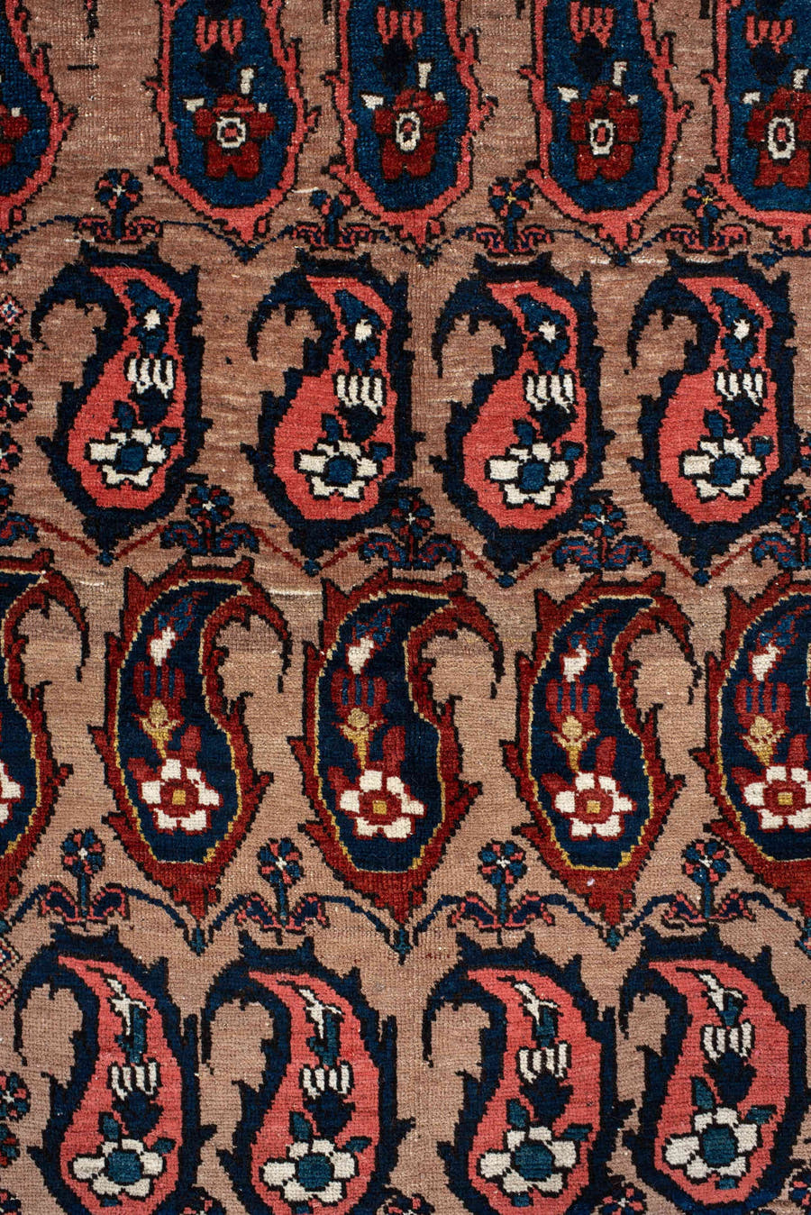 4' x 7' one-of-a-kind handmade antique Baktiary rug. Color palette: rust, indigo, ivory, brick, sky_blue, navy, cream, gold