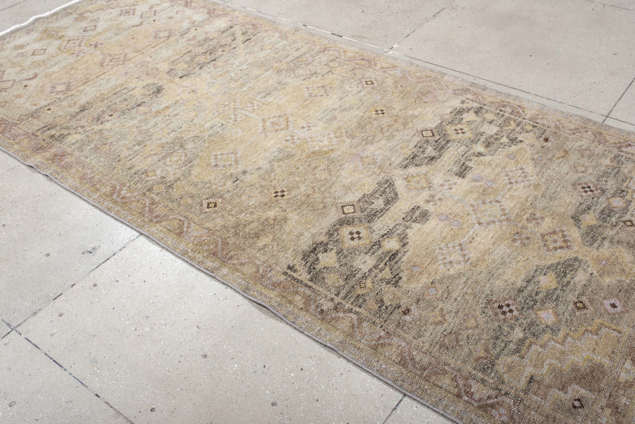 4' x 10' one-of-a-kind handmade antique Sarab runner rug. Color palette: ivory, camel, taupe, rose, charcoal, sage, tan