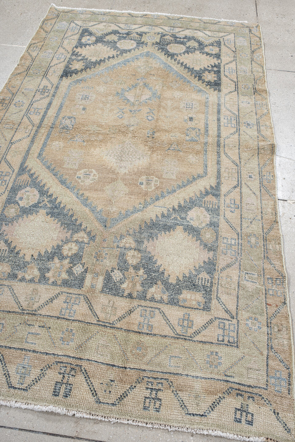 4' x 7' one-of-a-kind handmade antique Meshkin rug. Color palette: camel, ivory, pale blue, beige, taupe, light blue, gray