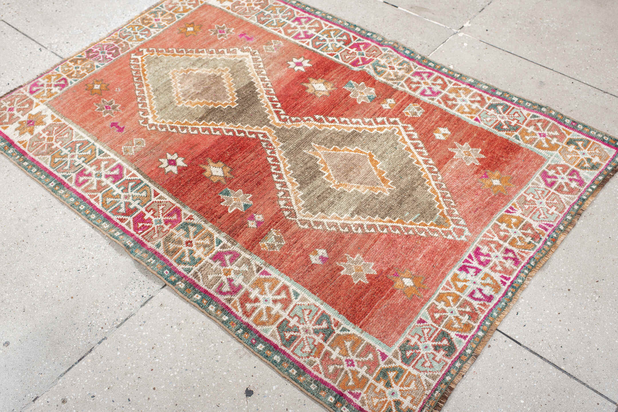 3' x 5' one-of-a-kind handmade vintage Gabbe small size rug. Color palette: terra cotta, ivory, taupe, rust, teal, magenta