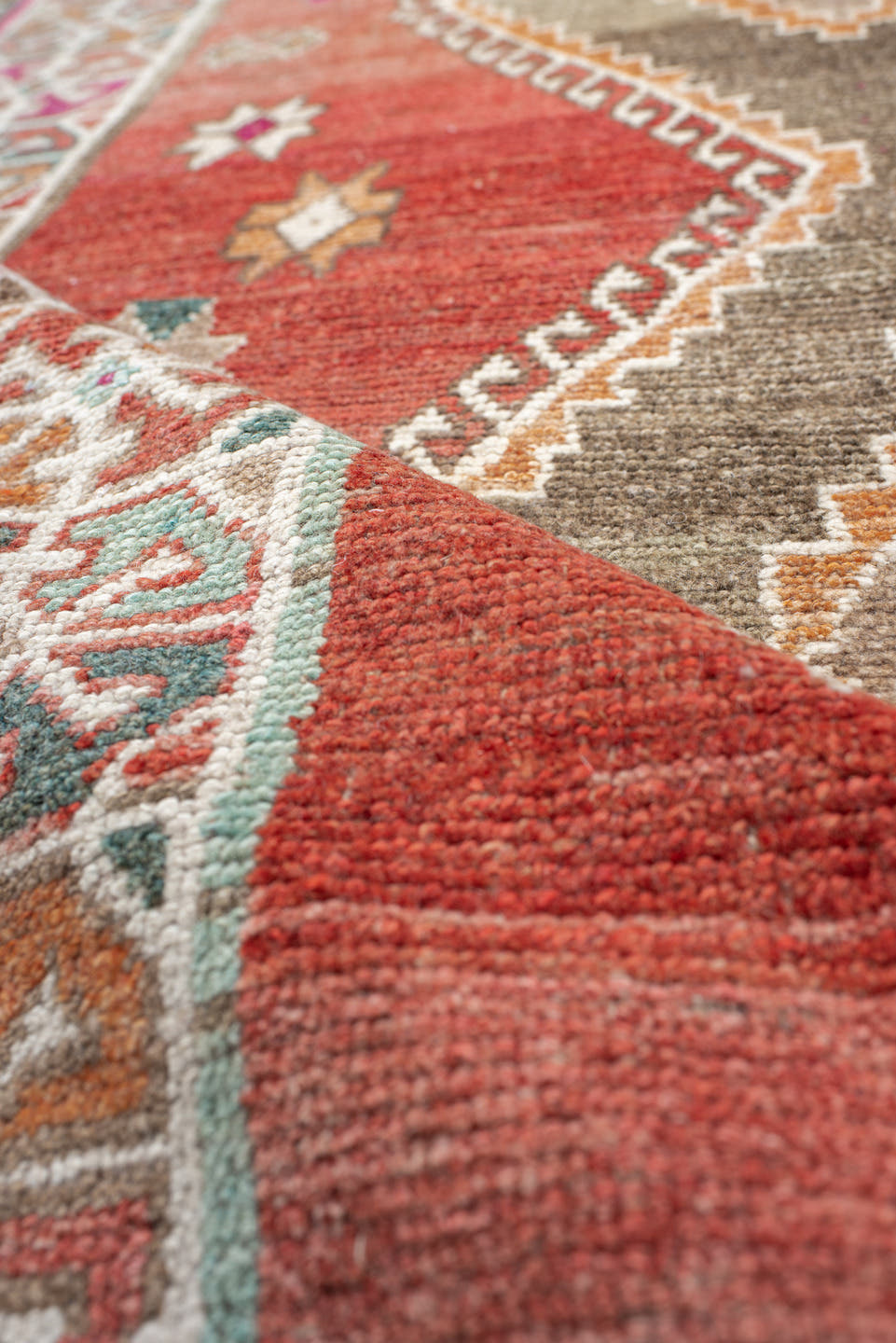 3' x 5' one-of-a-kind handmade vintage Gabbe small size rug. Color palette: terra cotta, ivory, taupe, rust, teal, magenta
