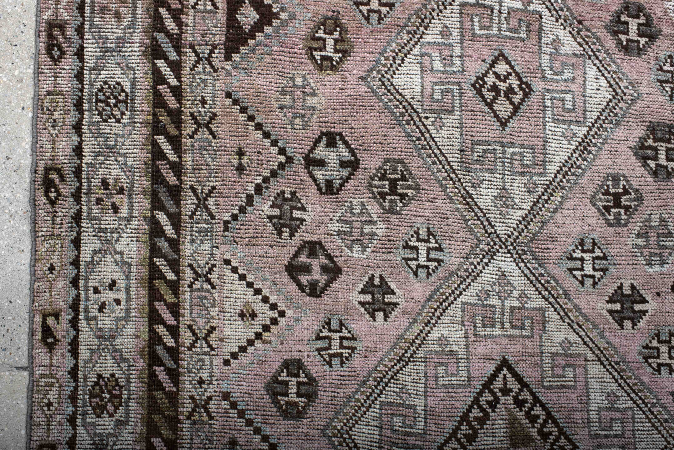 4' x 7' one-of-a-kind handmade antique Shiraz rug. Color palette: rose, ivory, brown, taupe, sage, charcoal, pink, red