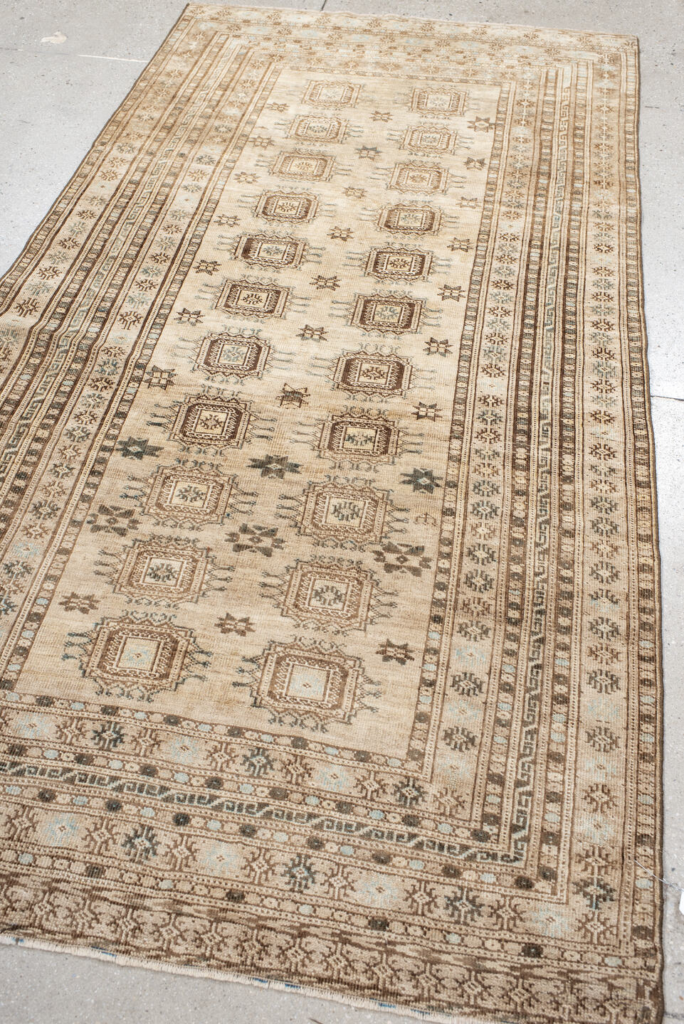 3' x 7' one-of-a-kind handmade vintage Afghan runner rug. Color palette: ivory, camel, taupe, brown, pale blue, charcoal