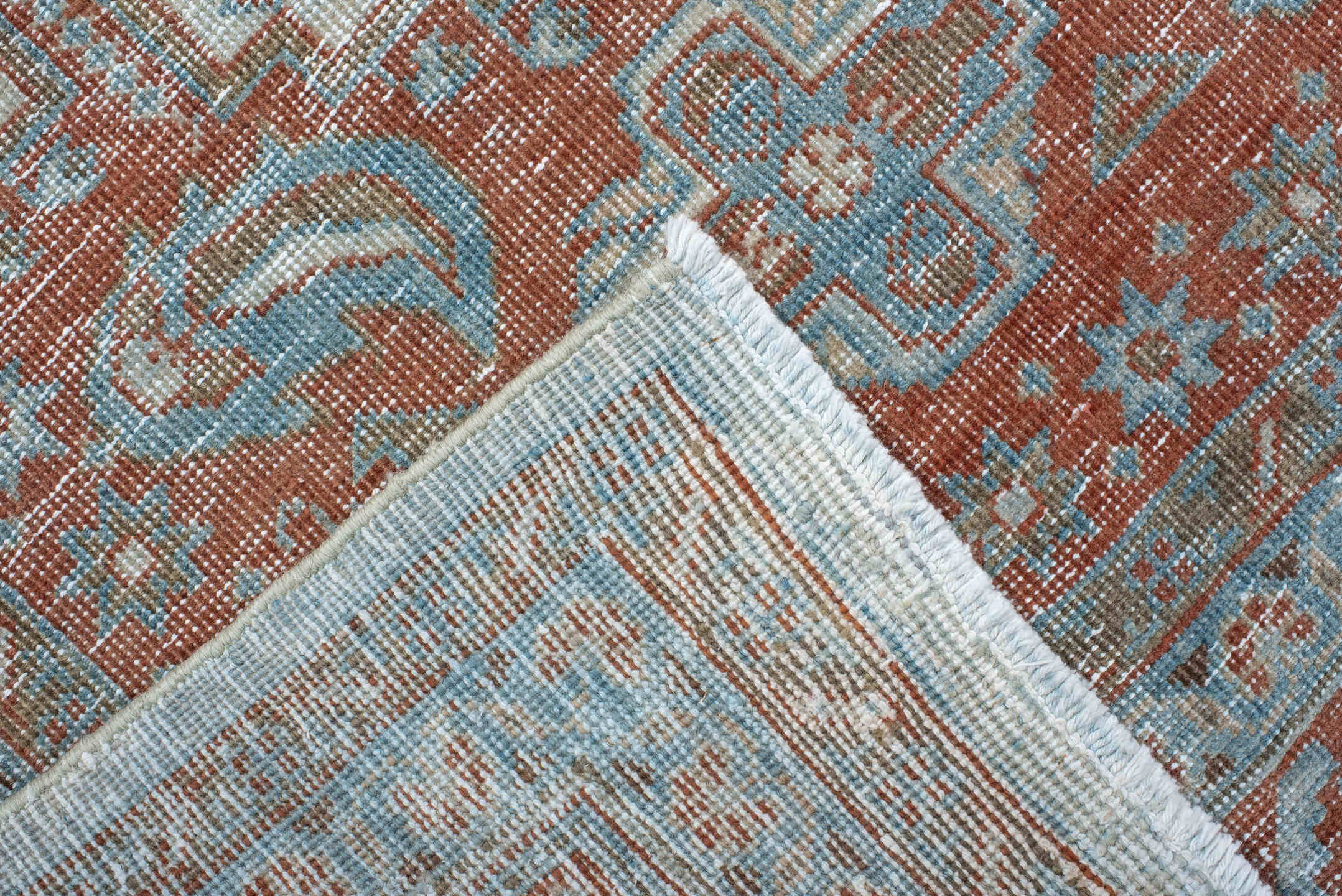 7' x 8' one-of-a-kind handmade antique Veece rug. Color palette: pale blue, rust, ivory, terracotta, sky blue, light blue