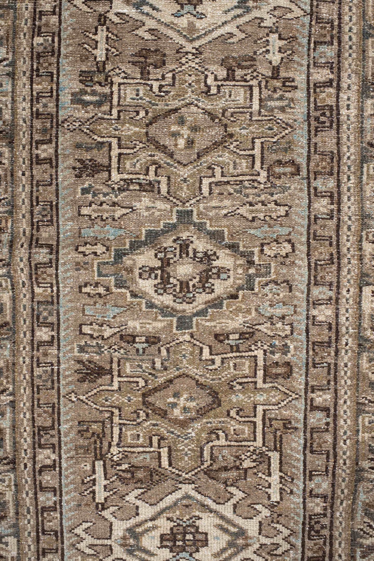 3' x 9' one-of-a-kind handmade antique Karaje runner rug. Color palette: taupe, brown, ivory, camel, slate, charcoal