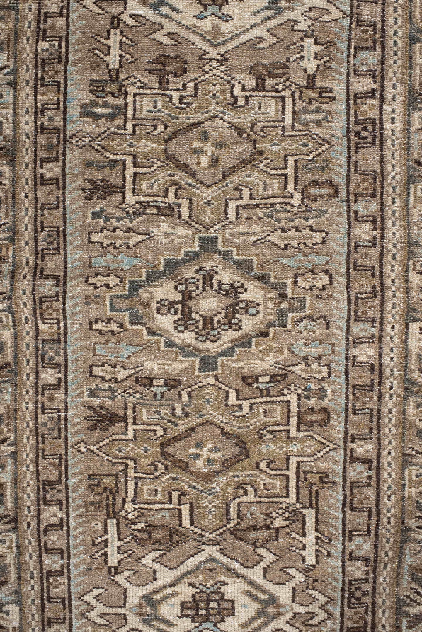3' x 9' one-of-a-kind handmade antique Karaje runner rug. Color palette: taupe, brown, ivory, camel, slate, charcoal