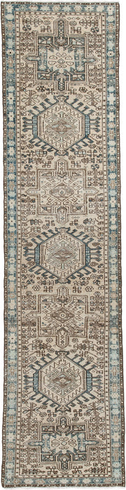 2' x 11' one-of-a-kind handmade antique Karaje runner rug. Color palette: ivory, sky blue, brown, taupe, camel, light blue