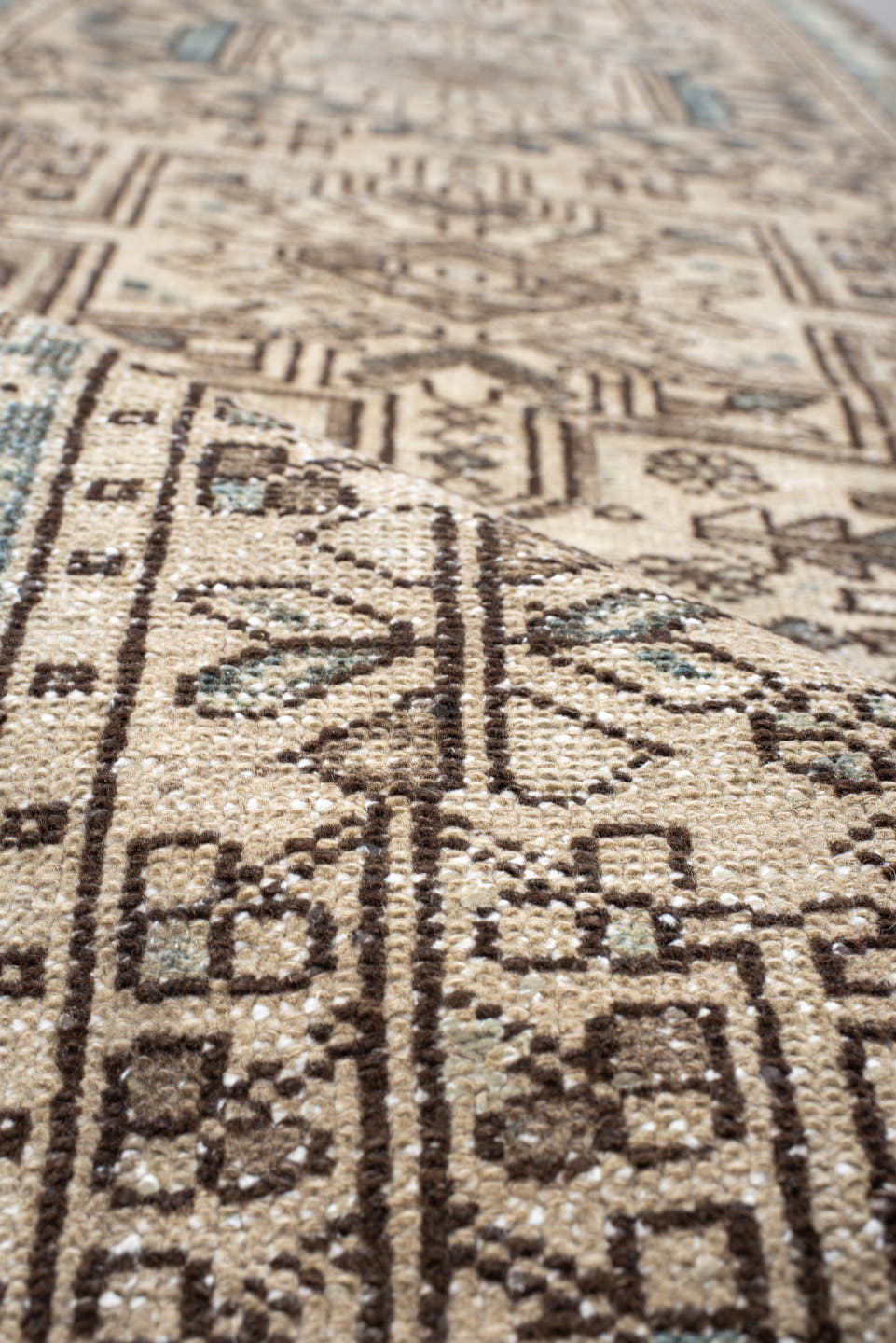 2' x 11' one-of-a-kind handmade antique Karaje runner rug. Color palette: ivory, sky blue, brown, taupe, camel, light blue