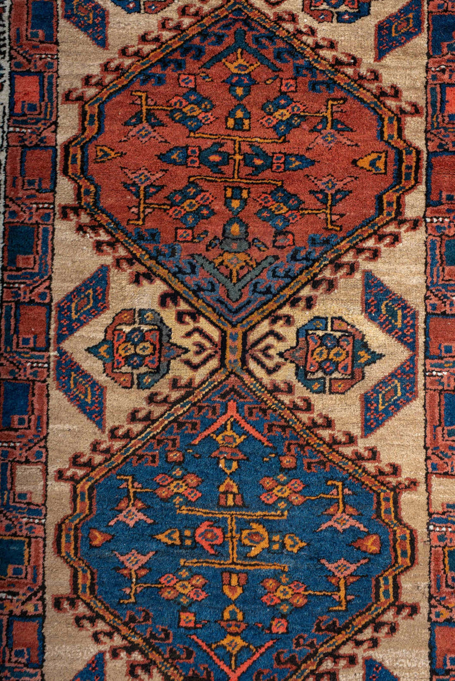 3' x 8' one-of-a-kind handmade antique Sarab runner rug. Color palette: ivory, indigo, rust, navy, terra cotta, camel