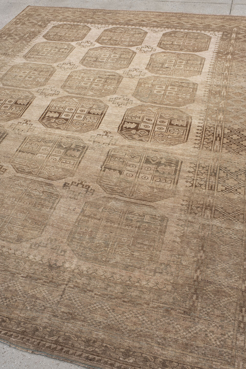 7' x 9' one-of-a-kind handmade antique Afghan large size rug. Color palette: taupe, beige, camel, ivory, brown, gray