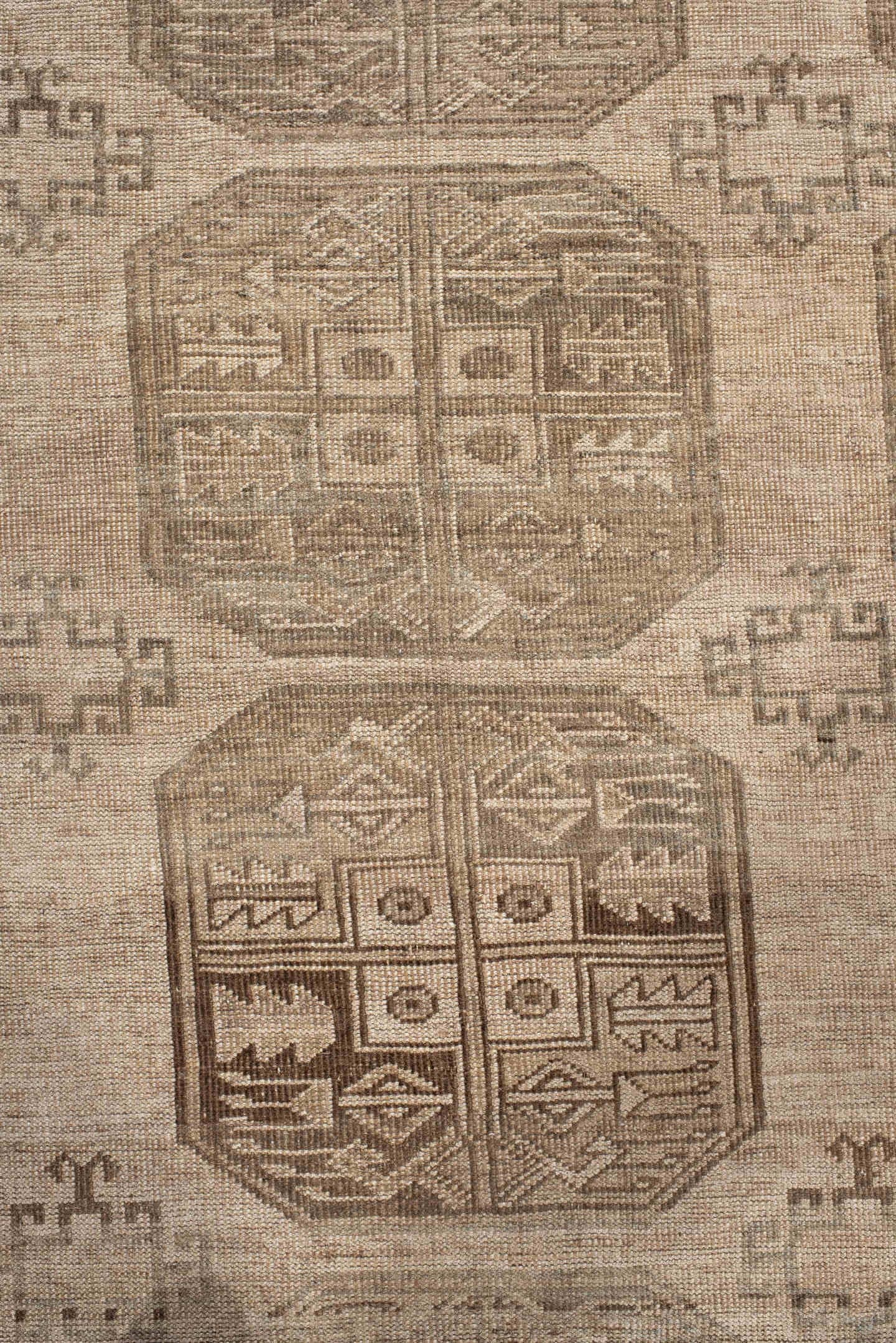 7' x 9' one-of-a-kind handmade antique Afghan large size rug. Color palette: taupe, beige, camel, ivory, brown, gray