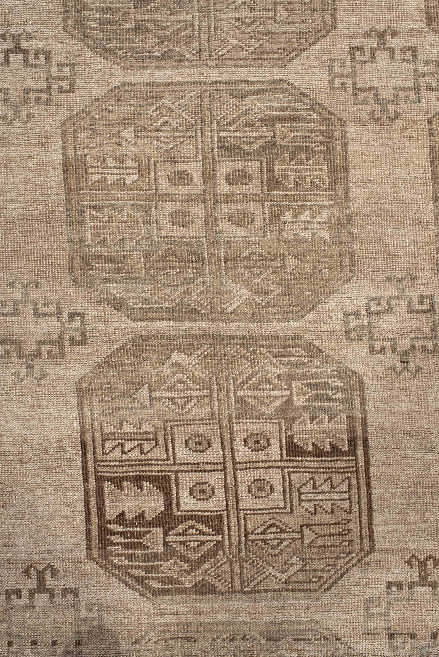 7' x 9' one-of-a-kind handmade antique Afghan large size rug. Color palette: taupe, beige, camel, ivory, brown, gray