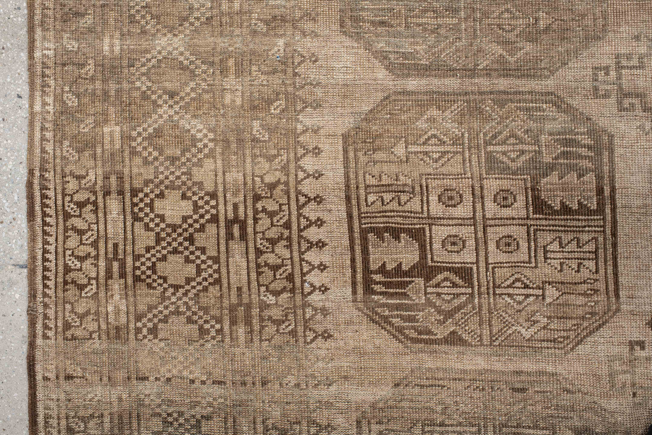 7' x 9' one-of-a-kind handmade antique Afghan large size rug. Color palette: taupe, beige, camel, ivory, brown, gray