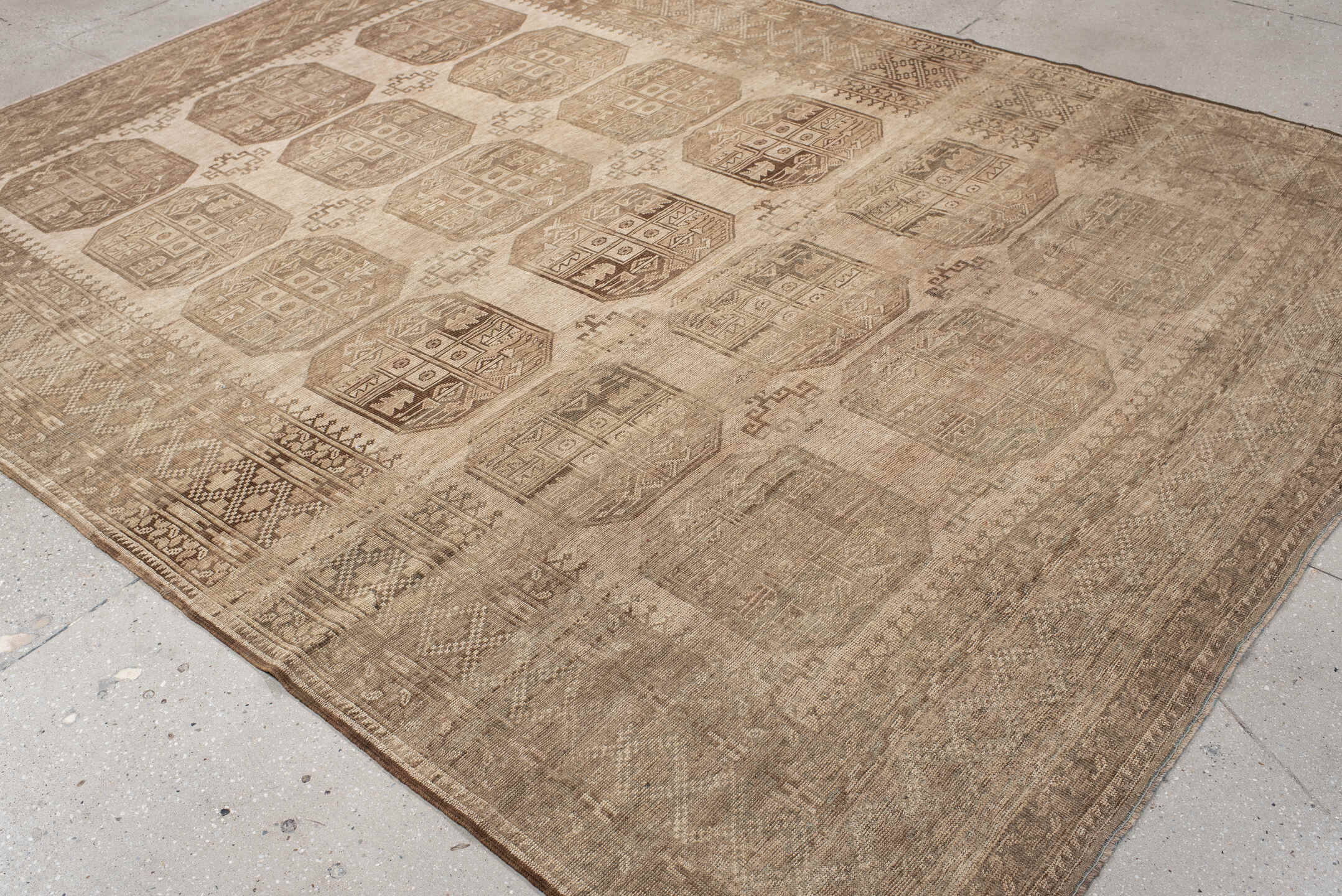 7' x 9' one-of-a-kind handmade antique Afghan large size rug. Color palette: taupe, beige, camel, ivory, brown, gray