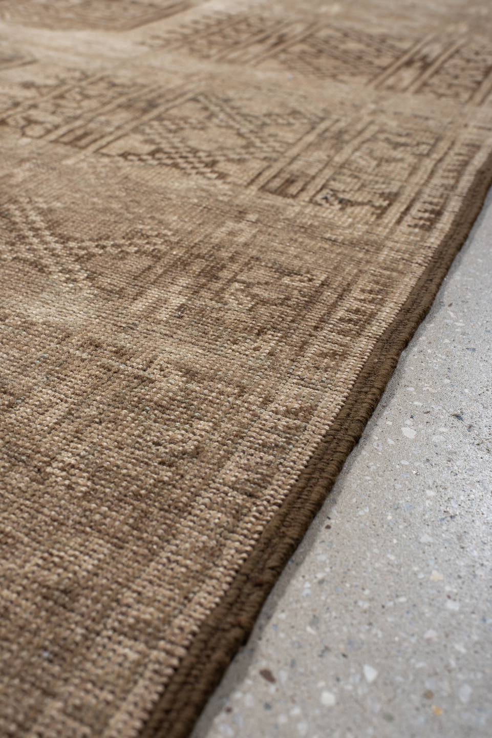 7' x 9' one-of-a-kind handmade antique Afghan large size rug. Color palette: taupe, beige, camel, ivory, brown, gray
