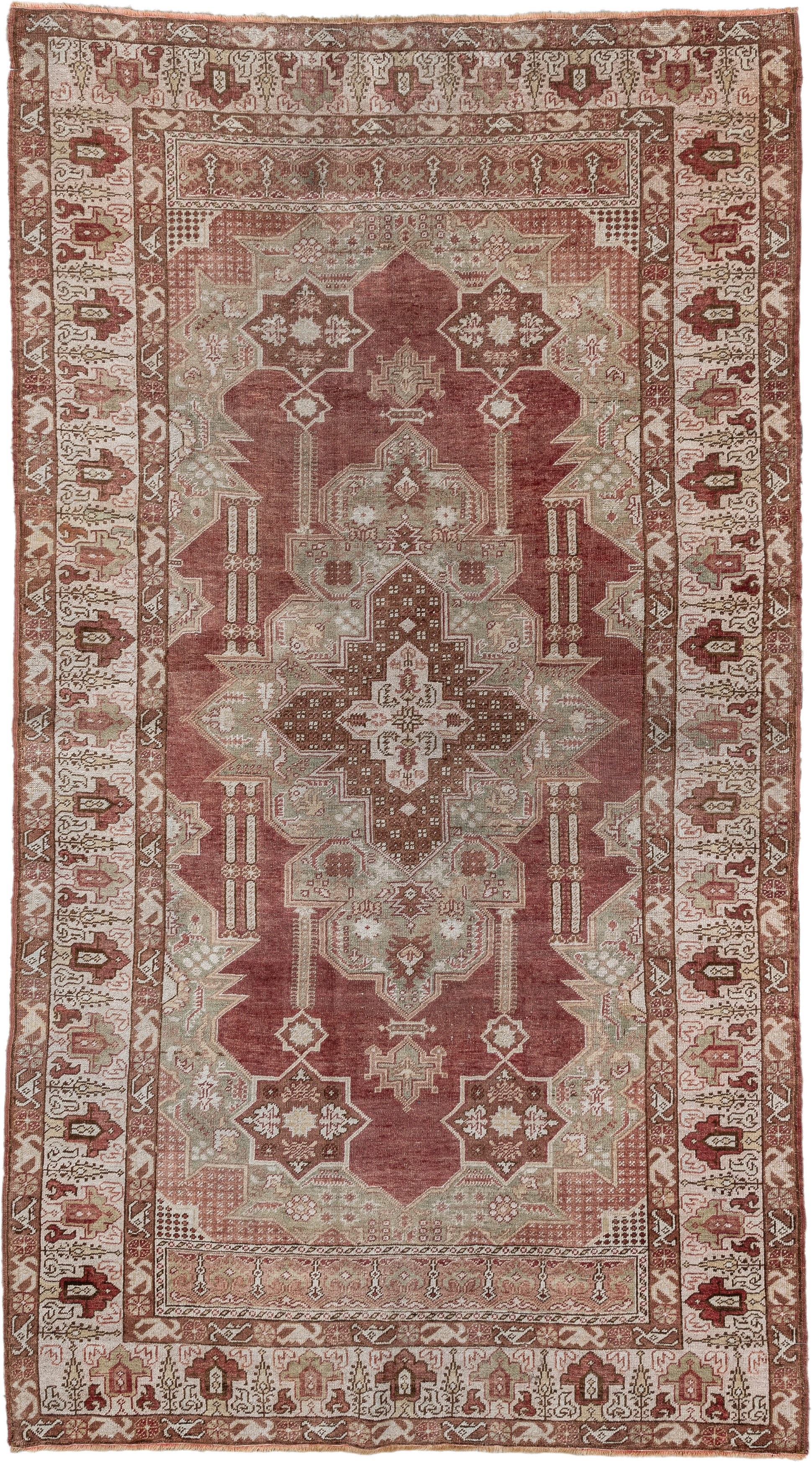 4' x 8' one-of-a-kind handmade vintage Anatolian rug. Color palette: terra cotta, ivory, sage, rust, taupe, rose, brown