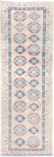 3' x 10' one-of-a-kind handmade antique Sarab runner rug. Color palette: ivory, sky blue, rose, beige, taupe, light blue