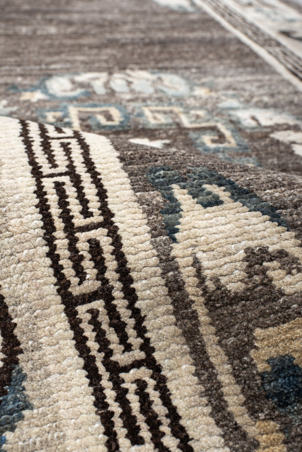 3' x 6' one-of-a-kind handmade antique Tibetan runner rug. Color palette: taupe, ivory, charcoal, slate, cream, gold, beige