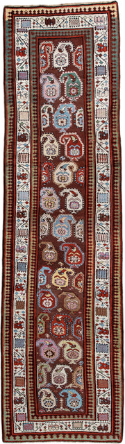 3' x 11' one-of-a-kind handmade antique Sarab runner rug. Color palette: rust, ivory, sky blue, crimson, brown, sage, pink