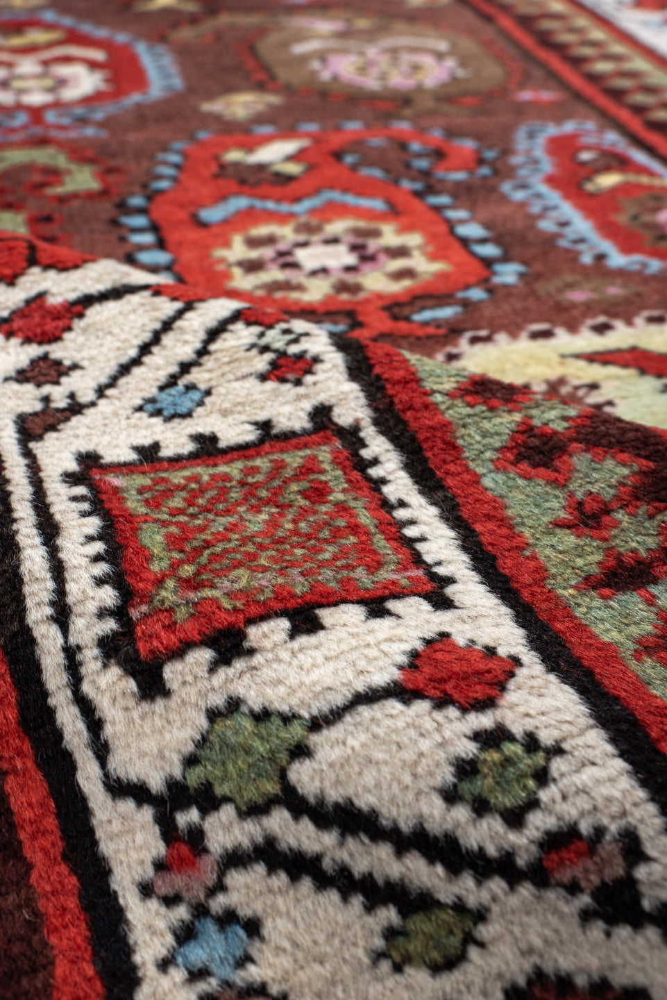 3' x 11' one-of-a-kind handmade antique Sarab runner rug. Color palette: rust, ivory, sky blue, crimson, brown, sage, pink