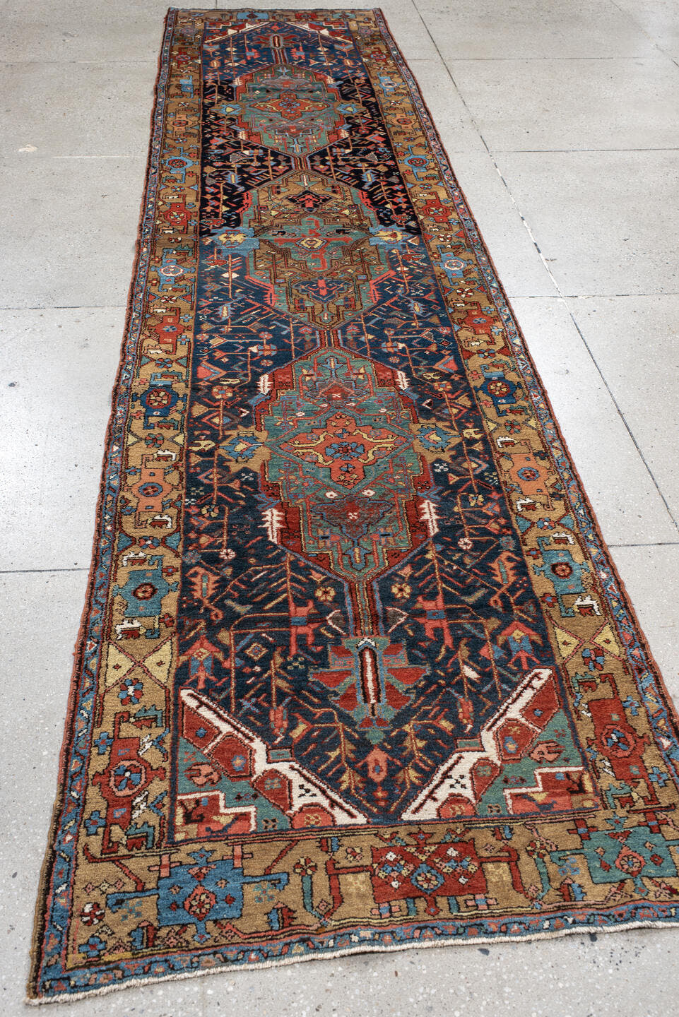 3' x 14' one-of-a-kind handmade antique Karaje runner rug. Color palette: navy, camel, sky_blue, rust, ivory, turquoise
