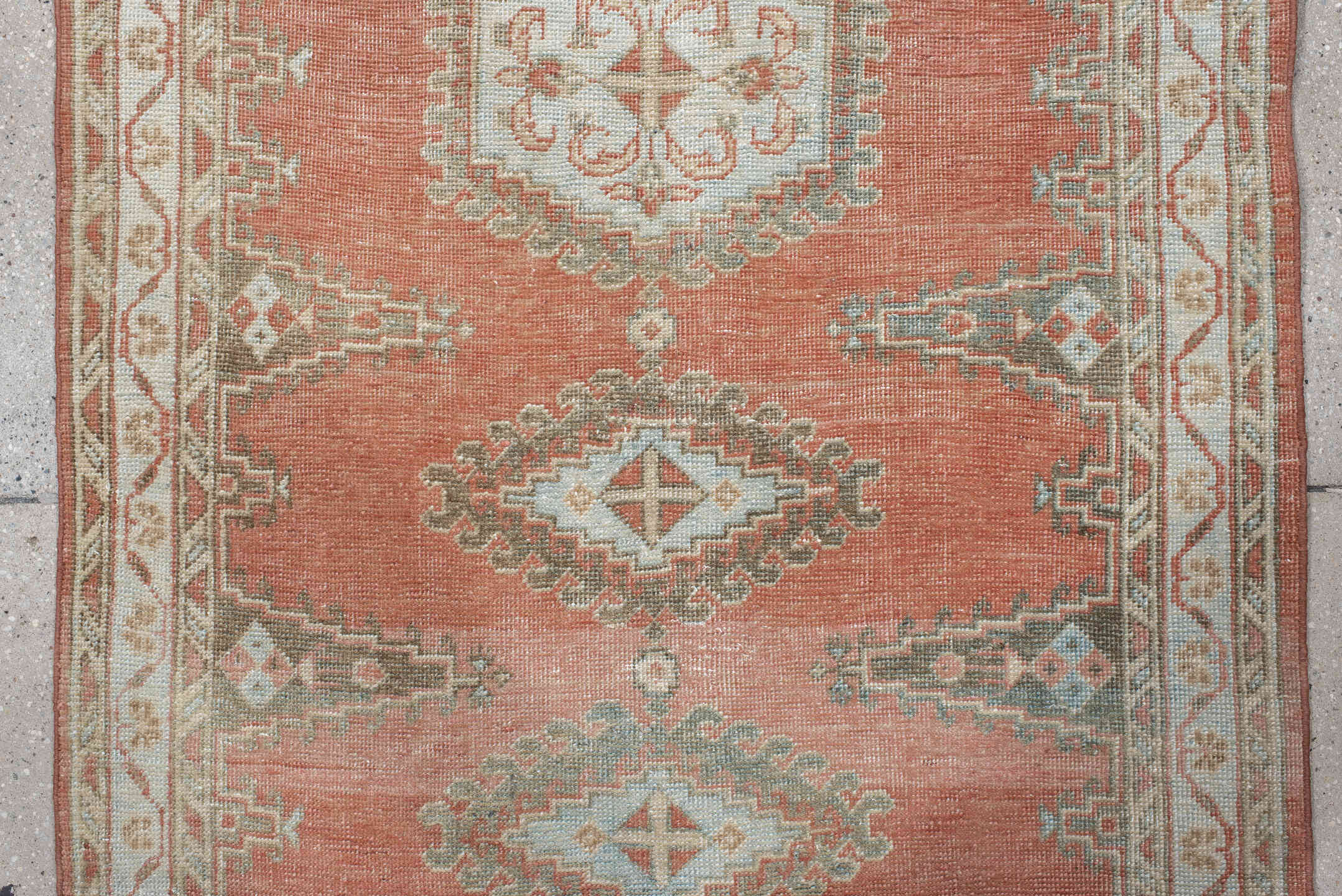 3' x 11' one-of-a-kind handmade antique Veece runner rug. Color palette: coral, ivory, pale blue, sage, cream, terra cotta