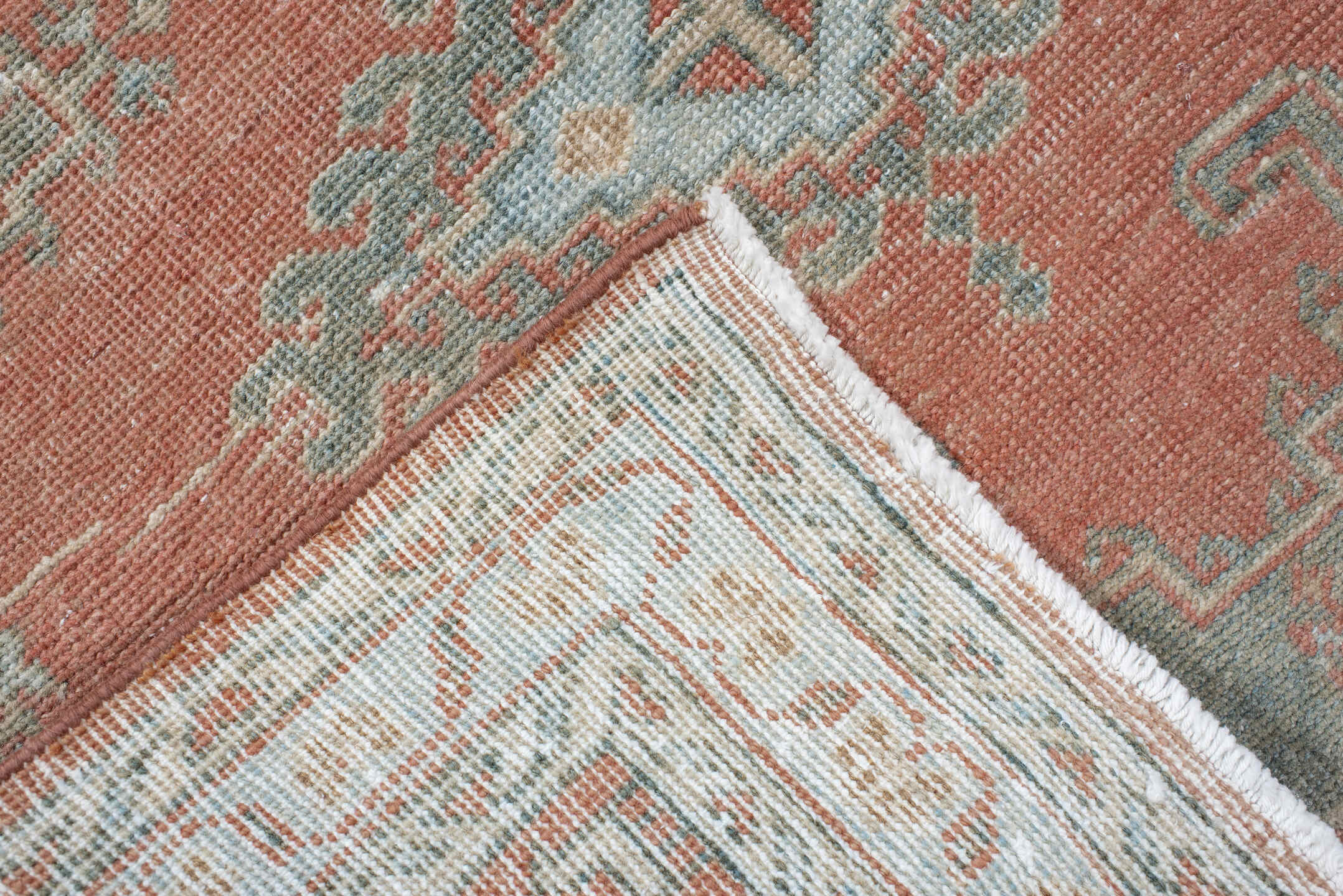 3' x 11' one-of-a-kind handmade antique Veece runner rug. Color palette: coral, ivory, pale blue, sage, cream, terra cotta