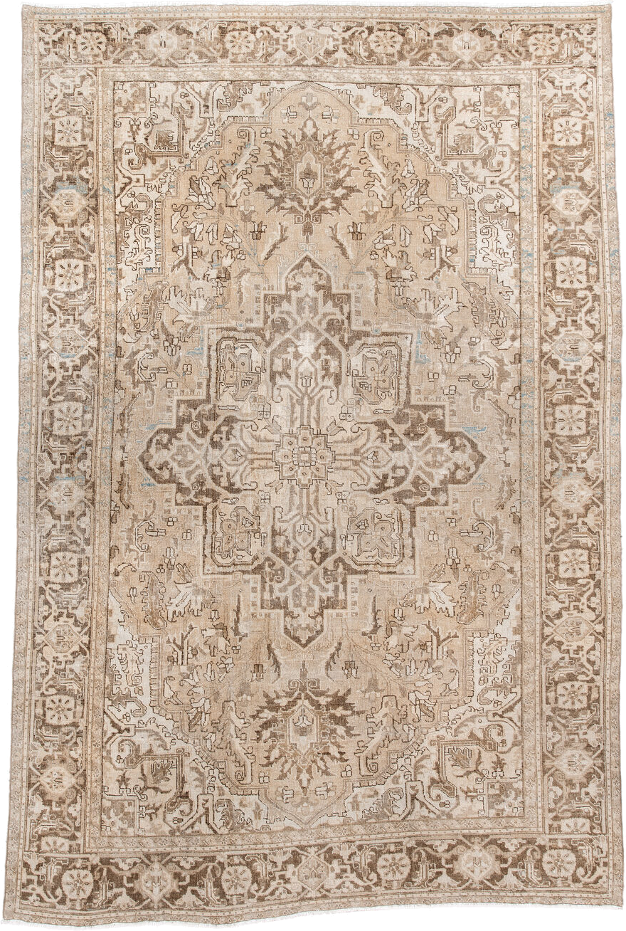 7' x 10' one-of-a-kind handmade antique Heriz large size rug. Color palette: ivory, taupe, beige, brown, camel, pale blue