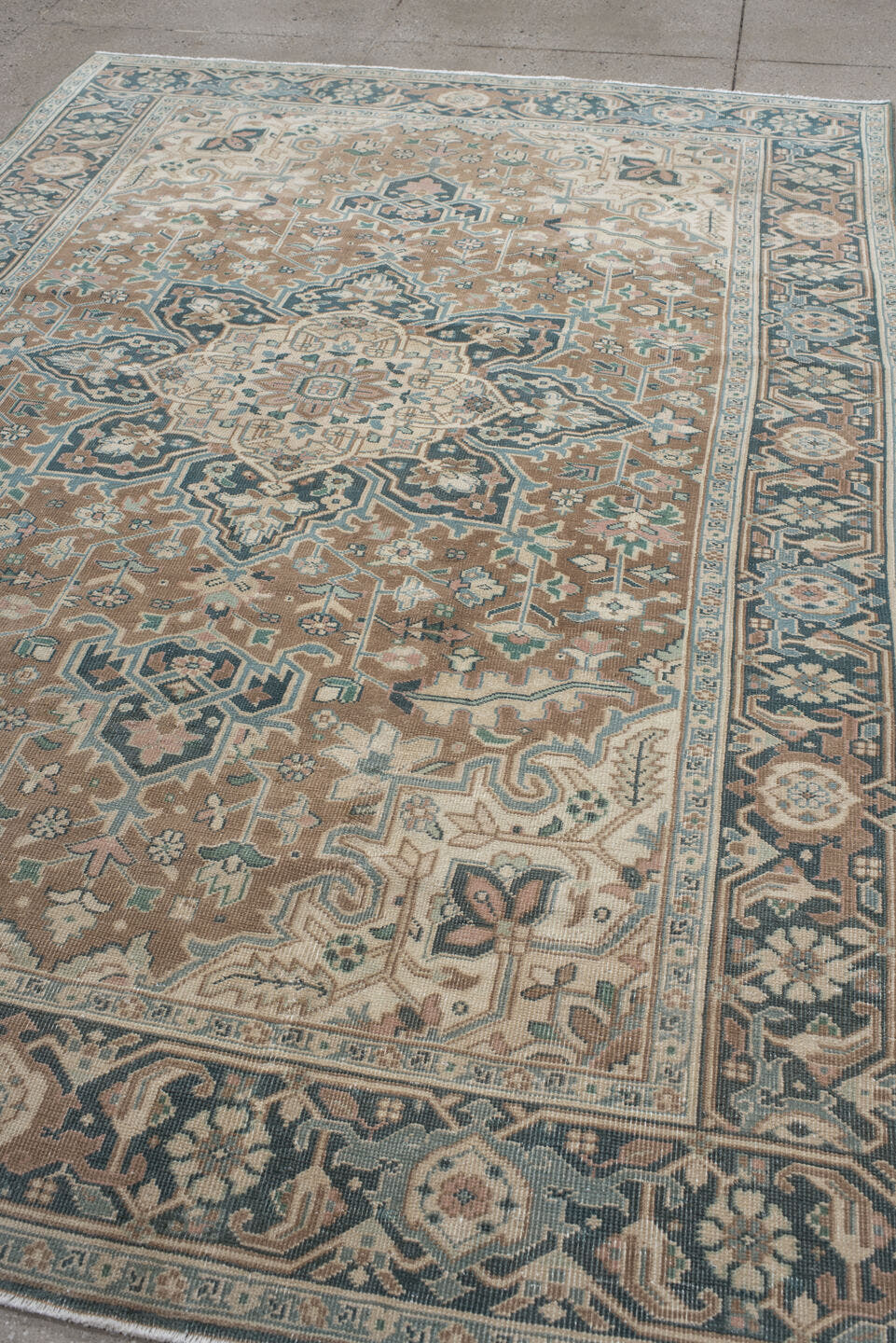 6' x 9' one-of-a-kind handmade antique Heriz medium size rug. Color palette: taupe, ivory, slate, cream, sage, charcoal