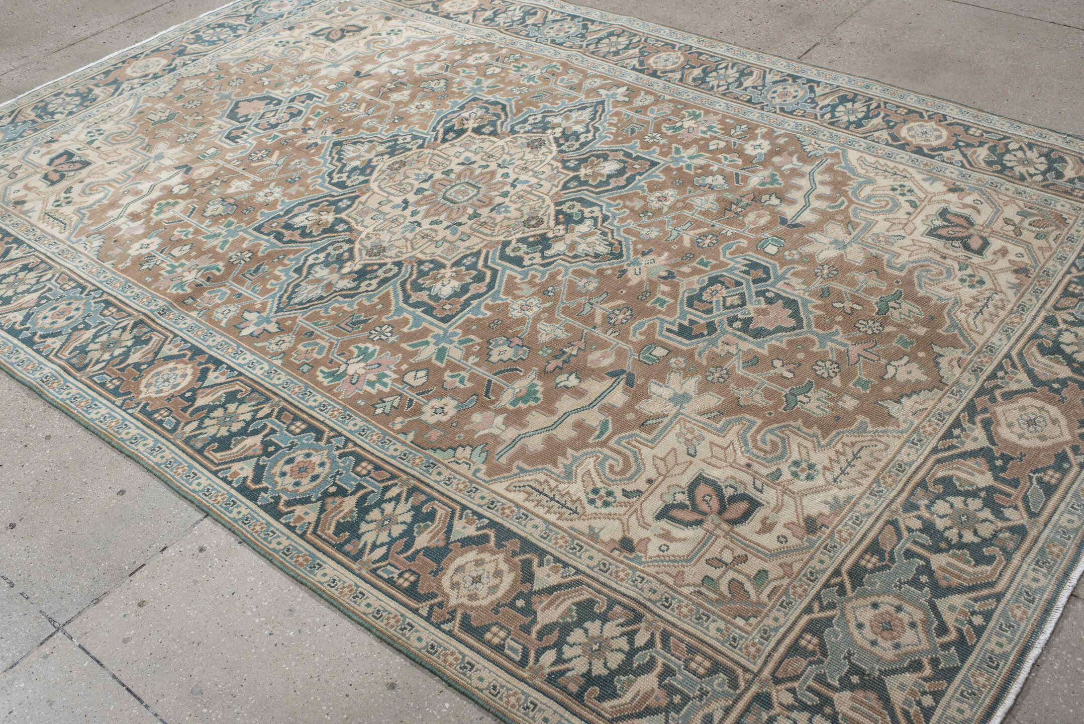 6' x 9' one-of-a-kind handmade antique Heriz medium size rug. Color palette: taupe, ivory, slate, cream, sage, charcoal