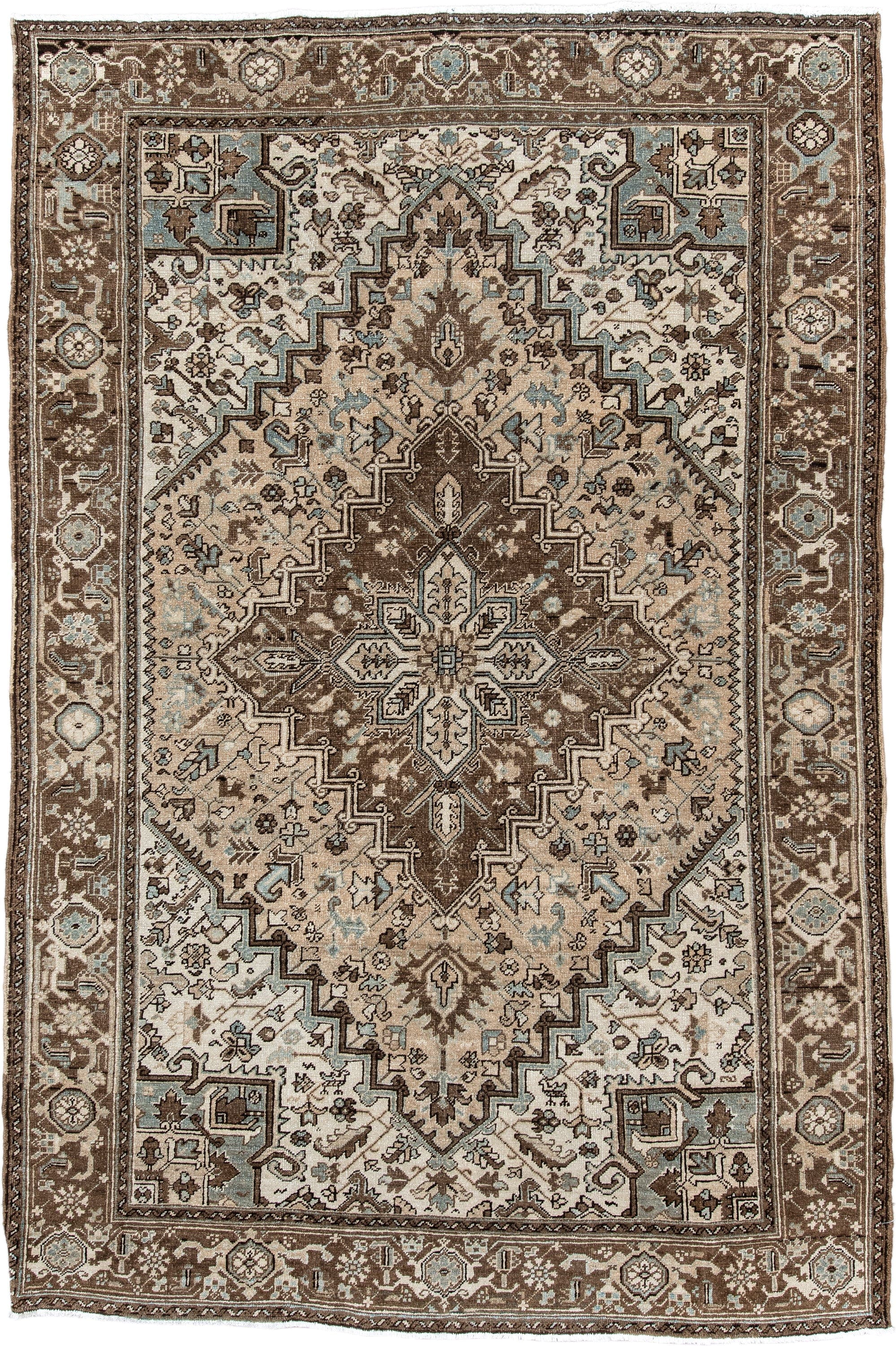 6' x 9' one-of-a-kind handmade antique Heriz medium size rug. Color palette: brown, ivory, sky blue, taupe, camel, slate