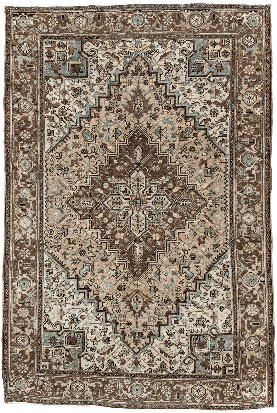 6' x 9' one-of-a-kind handmade antique Heriz medium size rug. Color palette: brown, ivory, sky blue, taupe, camel, slate