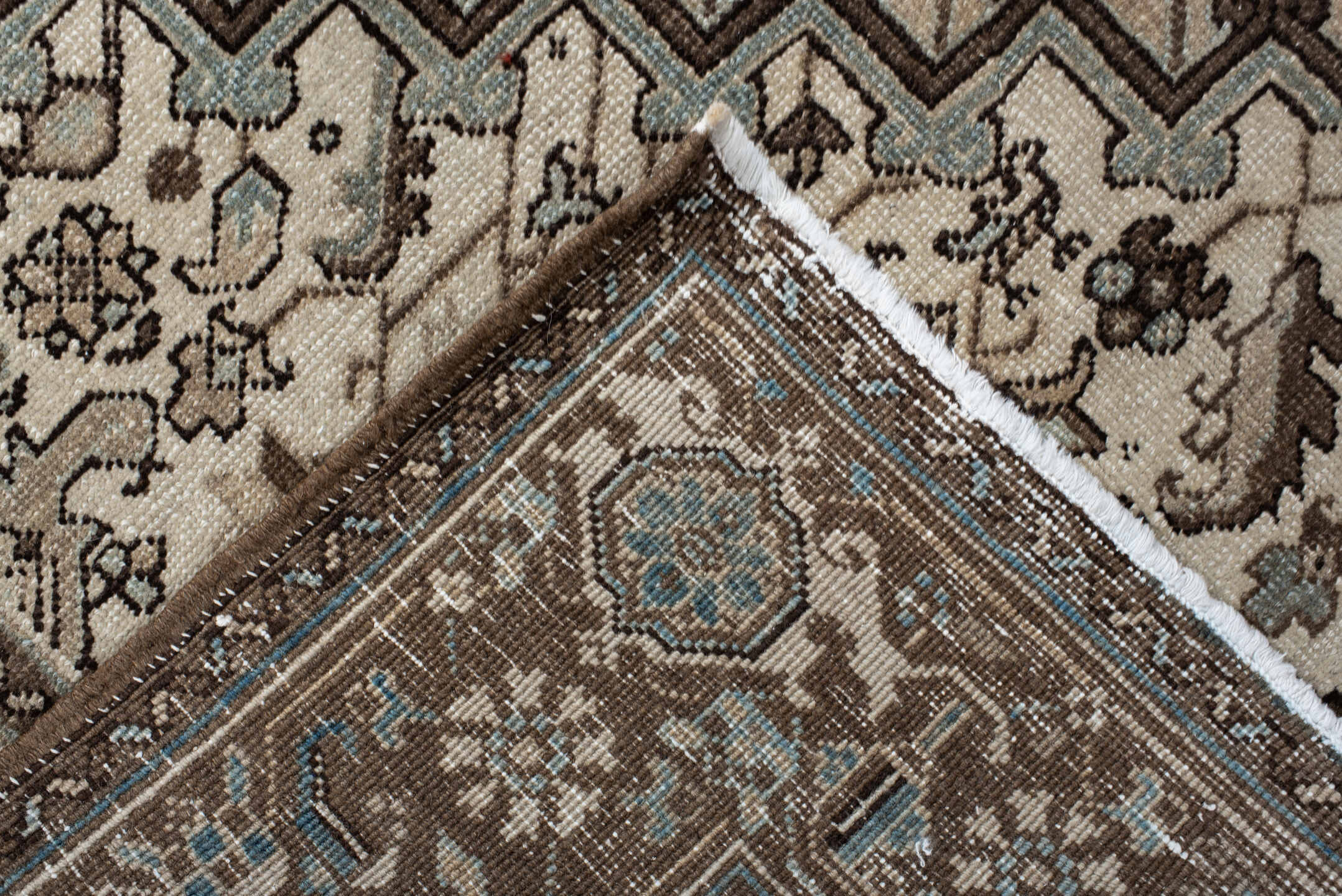 6' x 9' one-of-a-kind handmade antique Heriz medium size rug. Color palette: brown, ivory, sky blue, taupe, camel, slate