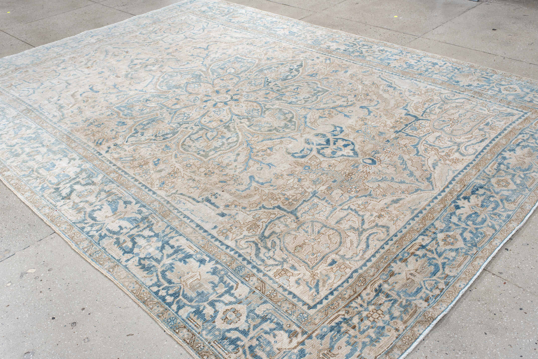 8' x 11' one-of-a-kind handmade antique Heriz large size rug. Color palette: ivory, pale blue, beige, sky blue, cream, taupe