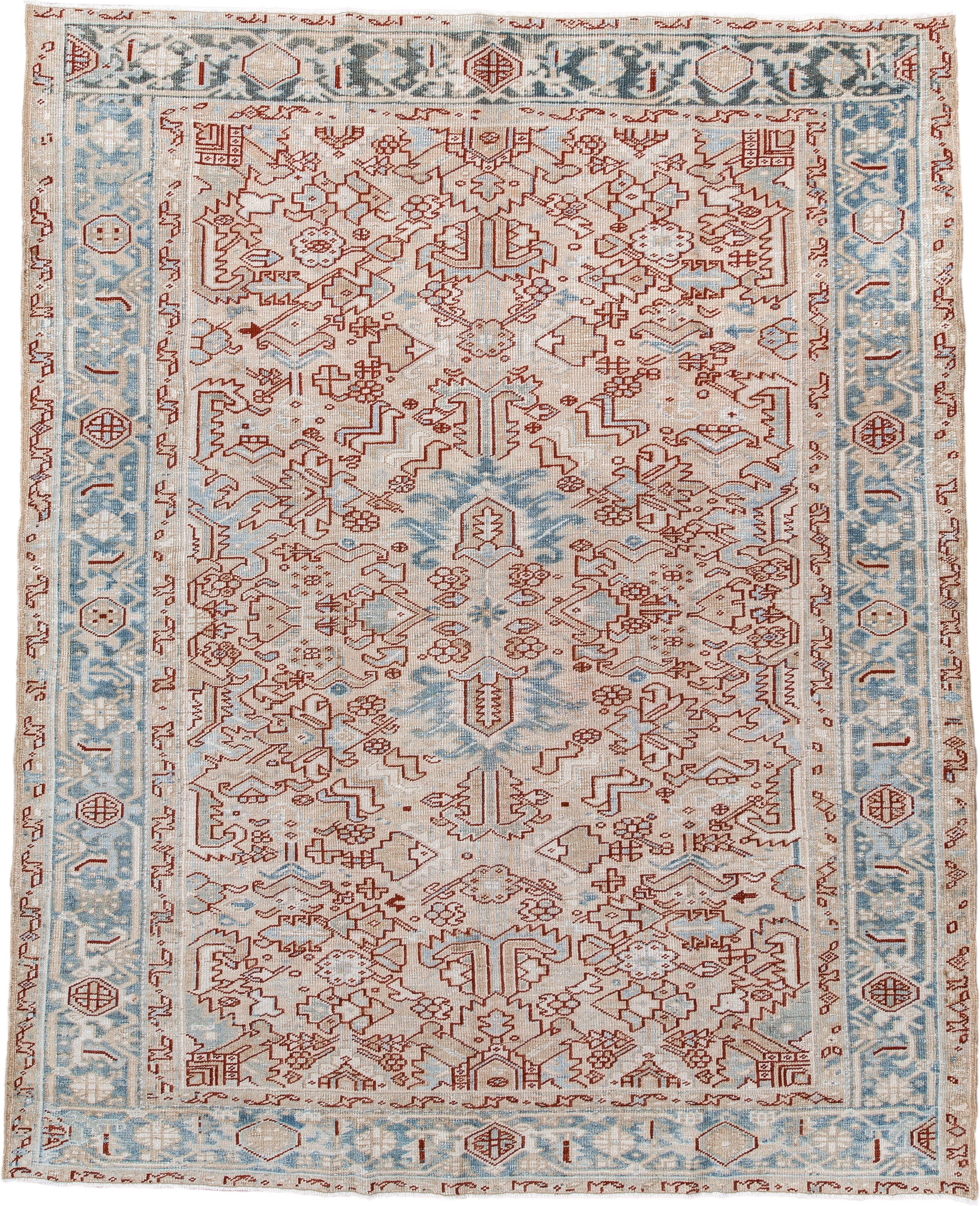 6' x 8' one-of-a-kind handmade antique Heriz medium size rug. Color palette: ivory, sky_blue, terracotta, pale_blue, rust