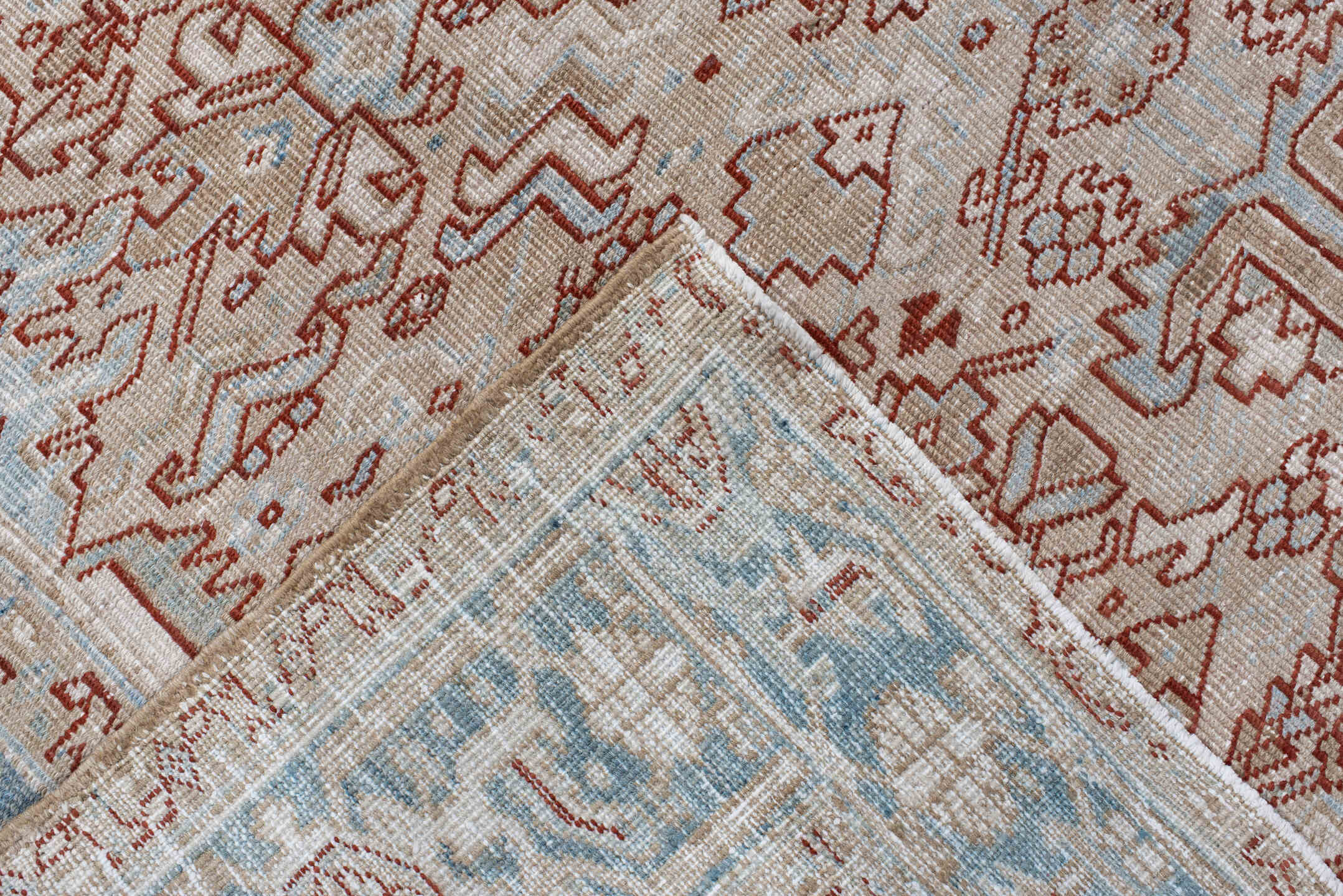 6' x 8' one-of-a-kind handmade antique Heriz medium size rug. Color palette: ivory, sky_blue, terracotta, pale_blue, rust