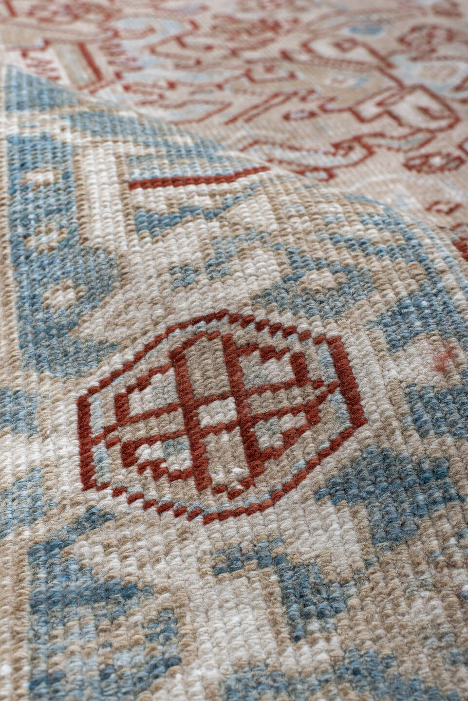 6' x 8' one-of-a-kind handmade antique Heriz medium size rug. Color palette: ivory, sky_blue, terracotta, pale_blue, rust