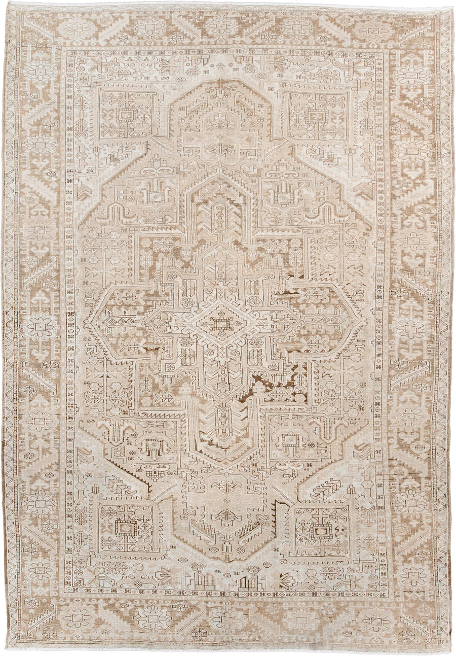 6' x 9' one-of-a-kind handmade antique Heriz medium size rug. Color palette: ivory, taupe, beige, sand, camel, gray