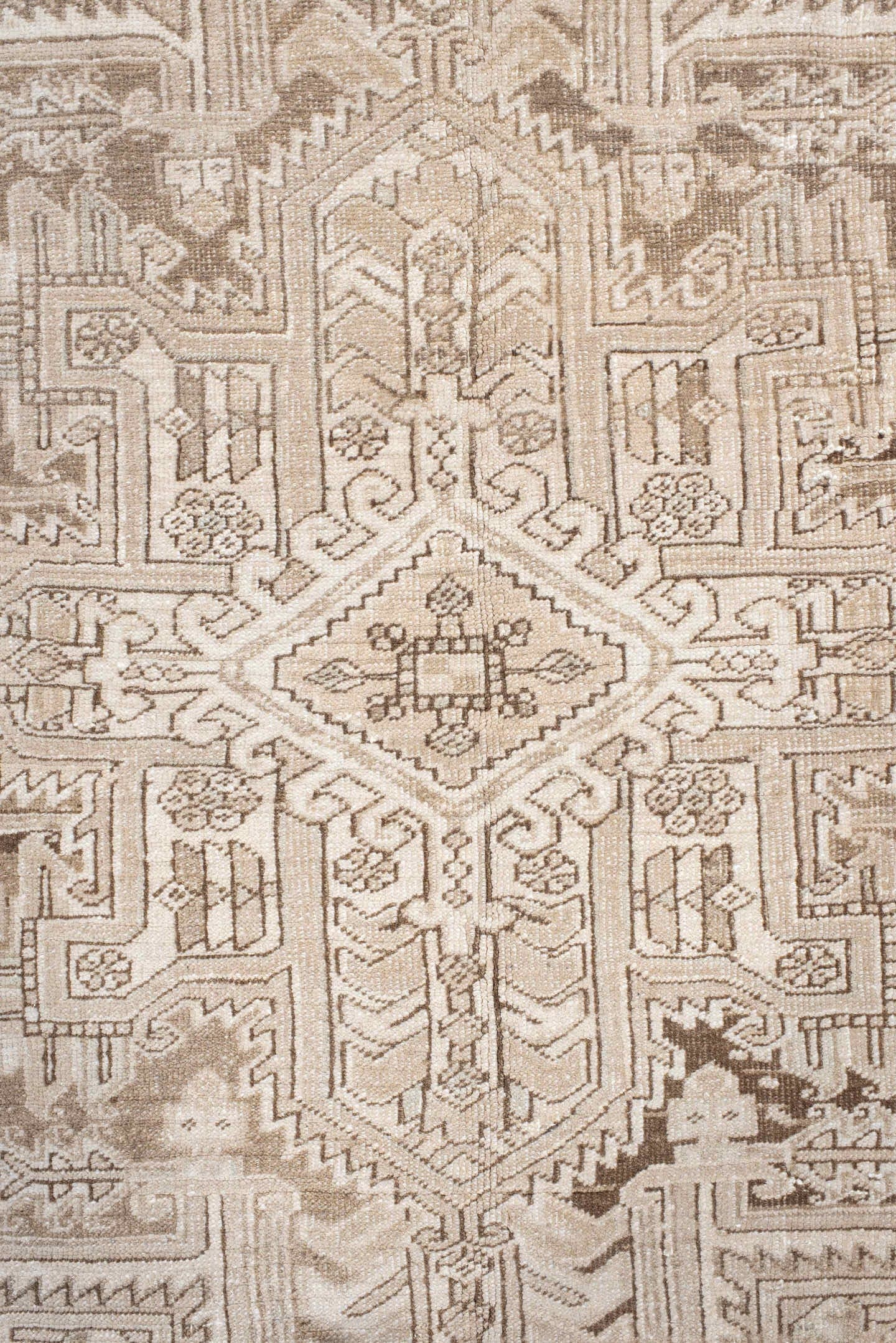 6' x 9' one-of-a-kind handmade antique Heriz medium size rug. Color palette: ivory, taupe, beige, sand, camel, gray