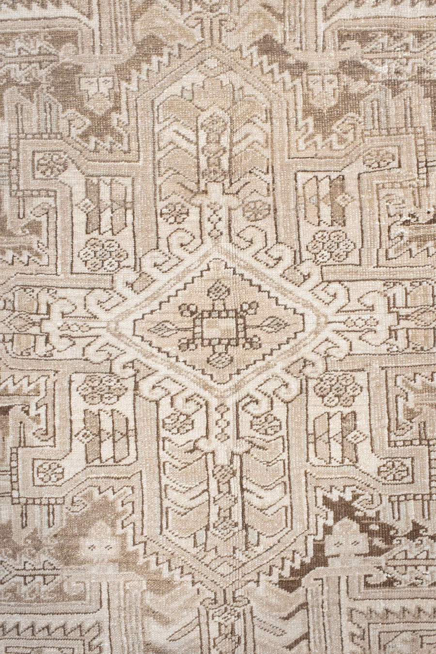 6' x 9' one-of-a-kind handmade antique Heriz medium size rug. Color palette: ivory, taupe, beige, sand, camel, gray