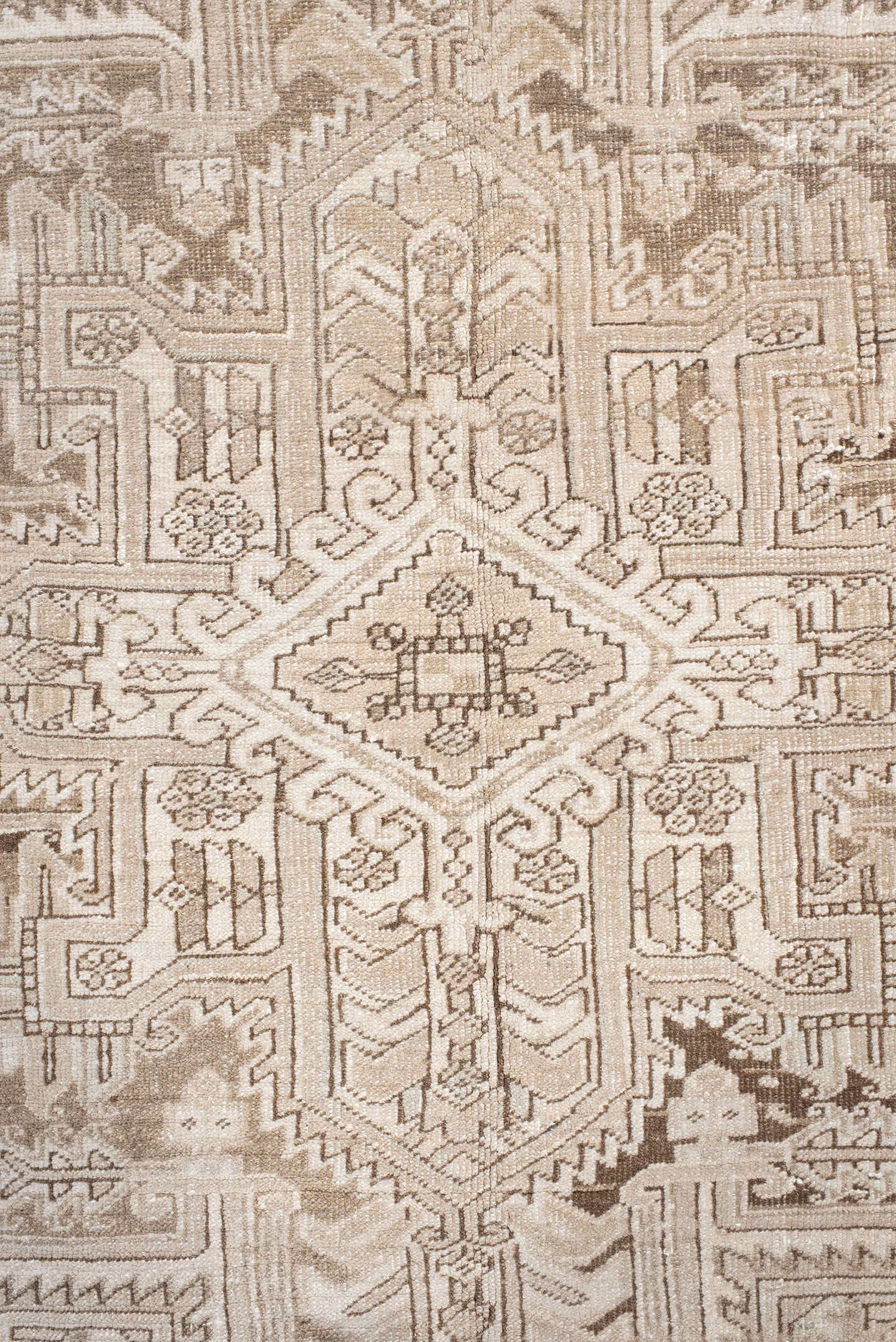 6' x 9' one-of-a-kind handmade antique Heriz medium size rug. Color palette: ivory, taupe, beige, sand, camel, gray